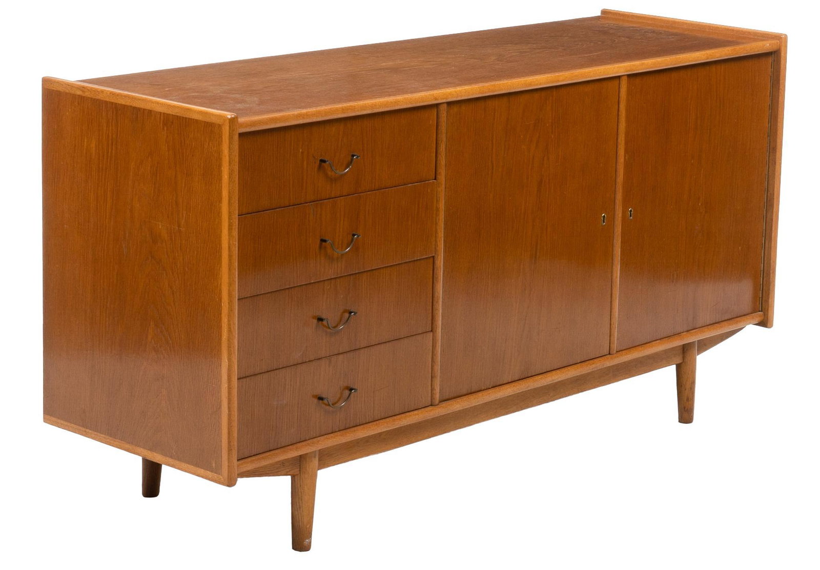 Danish Mid-Century Credenza: Danish Mid-Century teak credenza / sideboard, with recessed top, above stack of four drawers, next to cabinet doors opening to interior storage, above sculptural apron, splayed legs height 32 in. x wi