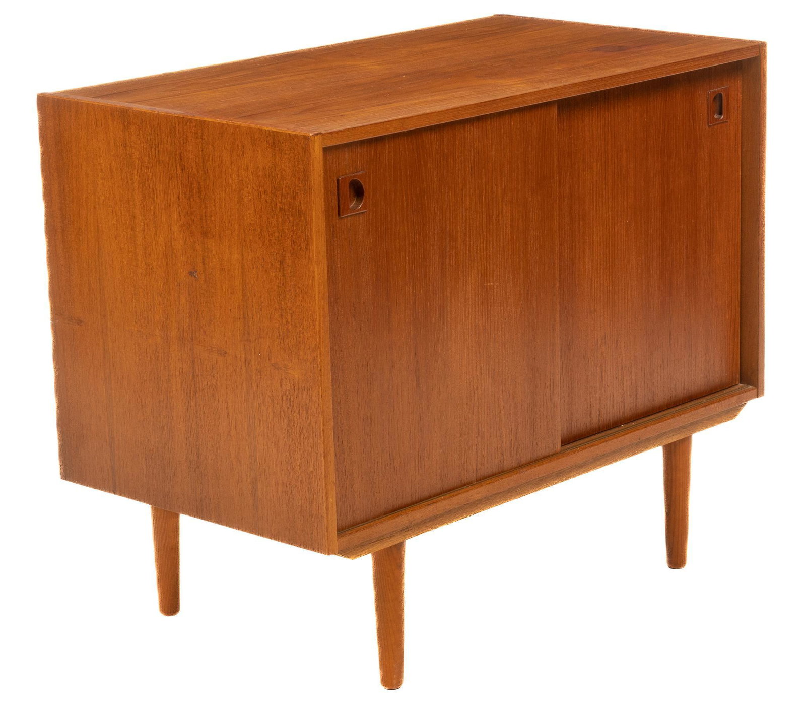 Danish Mid-Century Sideboard: Danish Mid-Century sideboard, with sliding cabinet doors, opening to interior shelf, supported on pin legs height 29 in. x width 35 in. x depth 20 in. We happily provide seamless shipping services on 