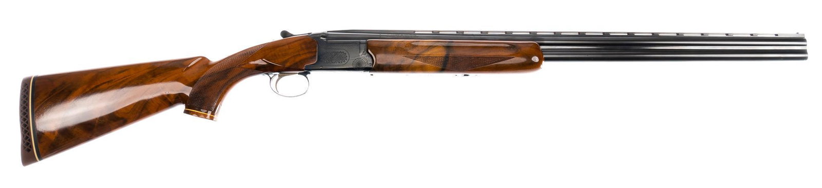 Weatherby Olympian 20-Gauge O/U Shotgun: Serial: R001516 Manufacturer: Weatherby, Japan Model: Olympian Caliber: 20 Ga. Barrel length: 26 in. (fixed chokes; mod & imp cyl) OAL: 43 in. Condition: Excellent; nicely figured walnut stock has