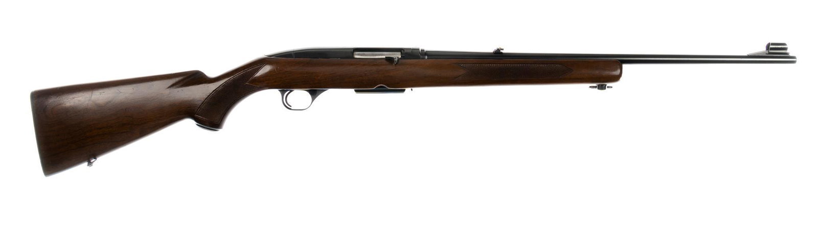Scarce Pre-64 Winchester Model 100 .284 WIN Semi-Auto Rifle: Serial: 75460 Manufacturer: Winchester (c. 1963) Model: 100 Caliber: .284 WIN Barrel length: 22 in. OAL: 42.5 in. Condition: Very Good; wood stock has light handling marks for age; barrel & receiv