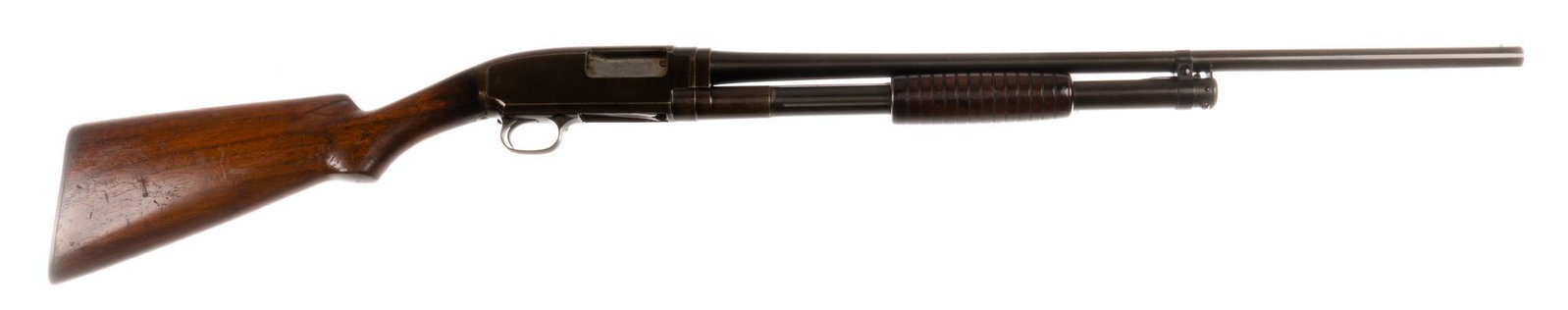 Early Winchester Model 1912 20-Gauge Shotgun: Serial: 9403 Manufacturer: Winchester Repeating Arms Co. (c. 1913) Model: 1912 Caliber: 20 Ga. (full choke) Barrel length: 25 in. OAL: 43.25 in. Condition: Fair; wood stock has heavy wear commensurate