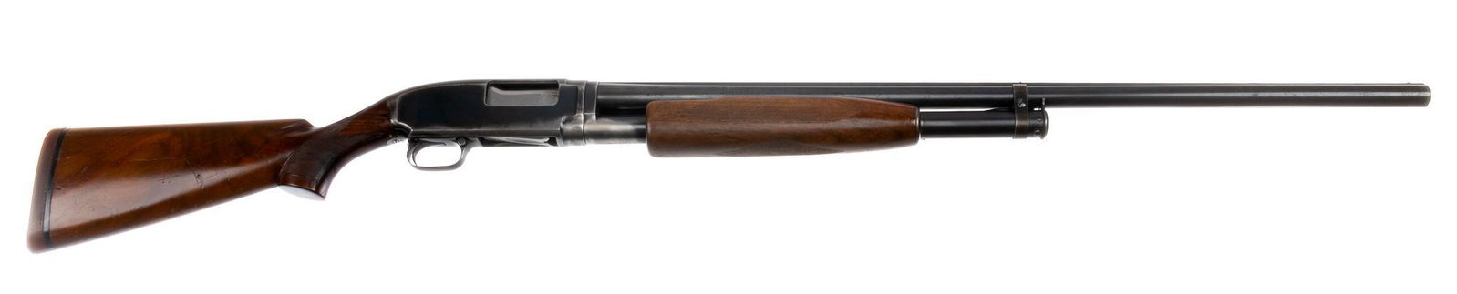 Pre-War Winchester Model 12 Trap 12-Gauge Shotgun: Serial: 823916 Manufacturer: Winchester (c. 1940) Model: 12 Trap Caliber: 12 Ga. (full choke) Barrel length: 29.75 in. OAL: 49 in. Condition: Good; wood stock has handling marks commensurate w/ age &a