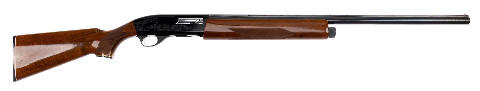 Smith & Wesson Model 1000 12-Gauge Semi-Auto Shotgun: Serial: FS00260 Manufacturer: Smith & Wesson Model: 1000 Caliber: 12 Ga. Barrel length: 28 in. OAL: 48.5 in. Condition: Good; wood stock has light handling marks; barrel & receiver have light