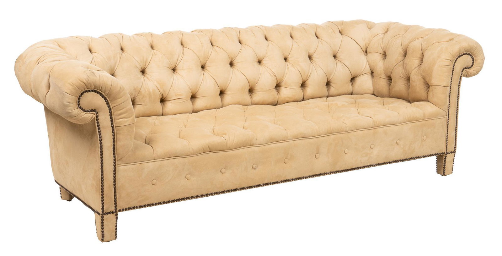 Chesterfield Sofa: Chesterfield sofa, with cream-colored tufted upholstery, scrolled arms, metal stud trim, supported on block legs height 29 in. x width 87 in. x. depth 34 in. We happily provide seamless shipping servi