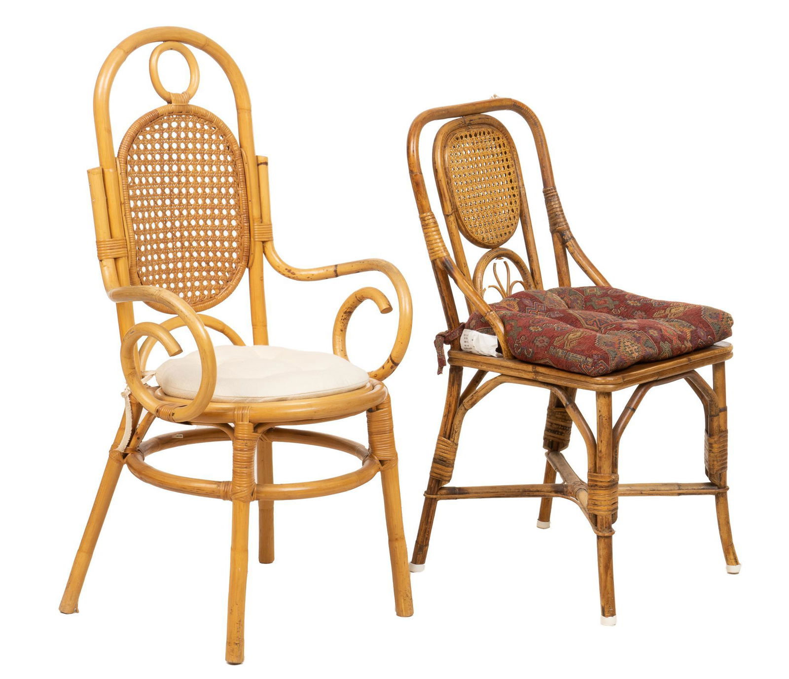 (2) Arts and Crafts Style Chairs: Two Arts and Crafts style chairs, in the style of Michael Thonet, with bentwood frames, featuring caned backs, curling and curved accents, removable cushions, supported on stretchered legs height 42