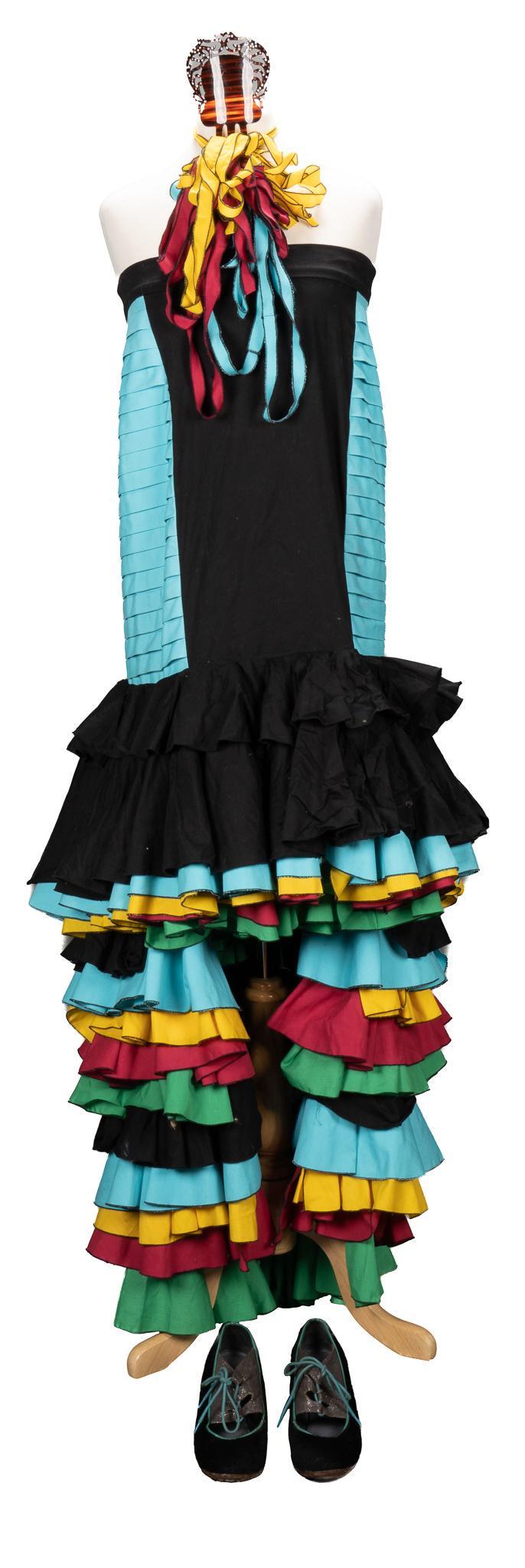Women's Flamenco Skirt: Women's flamenco skirt, custom-made, featuring multi-colored ruffles, including one Spanish hair clip, one pair of flamenco shoes, size women's 7 length 55.5 in. x flat waist width 14 in. Prov