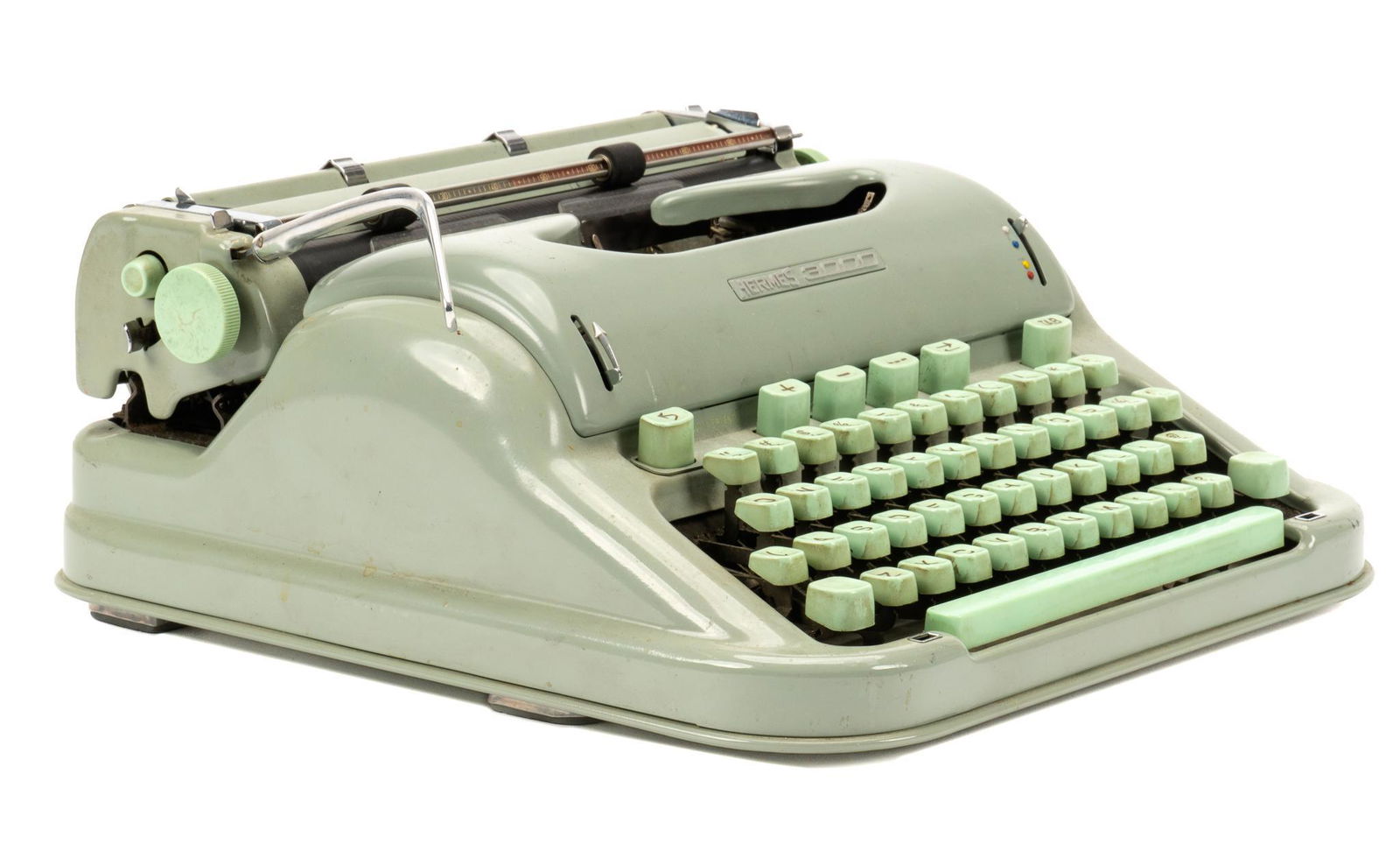 Hermes 3000 Typewriter: Hermes 3000 typewriter, green exterior, made in Switzerland by Paillard S.A., including ribbon, serial number "3342041", with case, manual, and two brushes, circa 1960s, used by Larry McMurtry