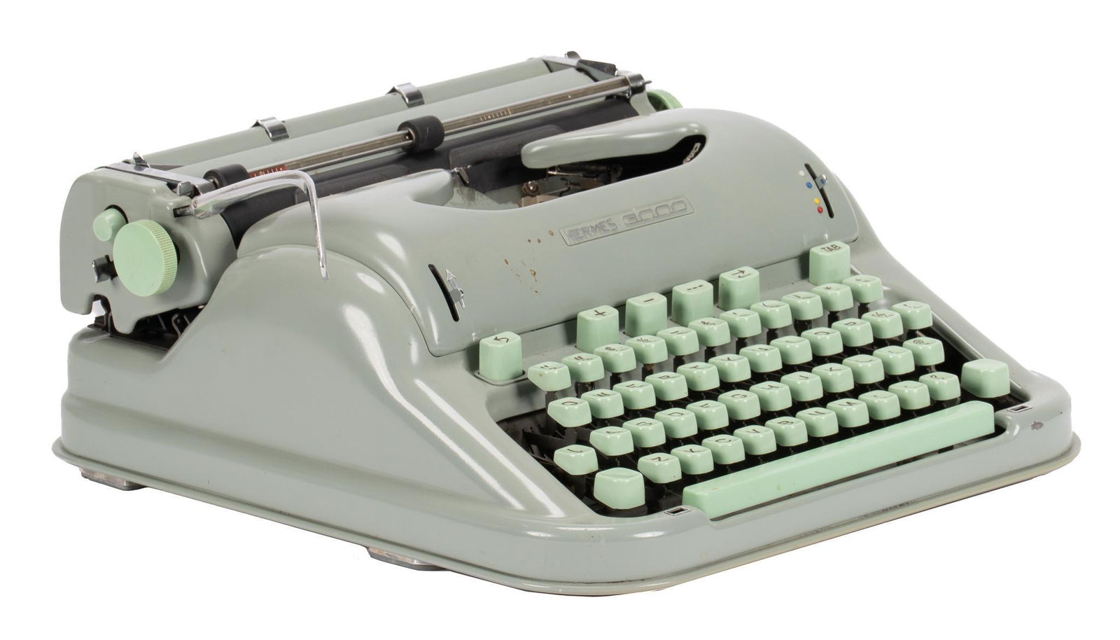 Hermes 3000 Typewriter: Hermes 3000 typewriter, green exterior, made in Switzerland by Paillard S.A., with ribbon, serial number "3239965", with case, circa 1960s, used by Larry McMurtry in his Archer City, Texas hom