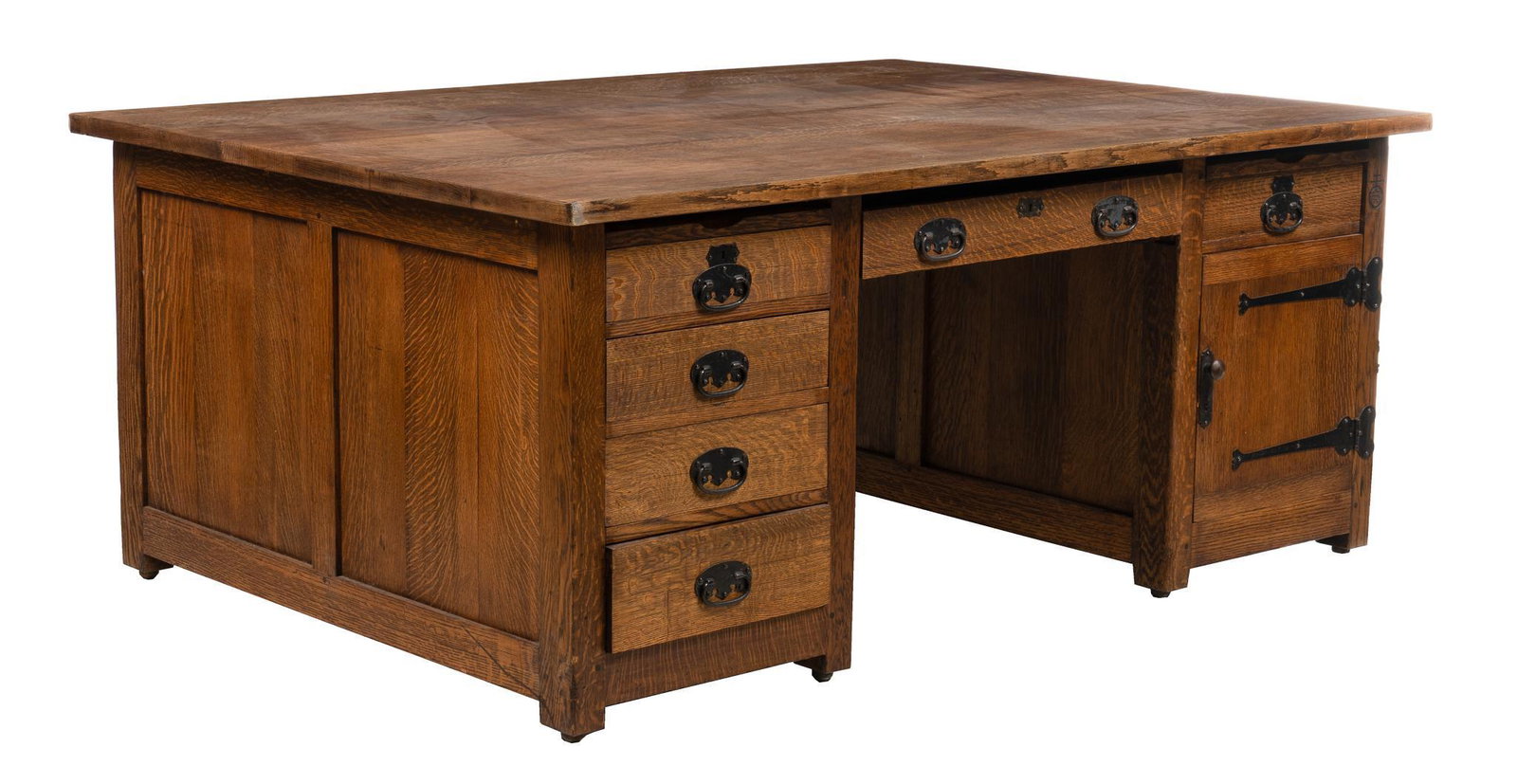 Larry McMurtry's Writing Desk, Roycroft Community (USA): Arts and Crafts partner's desk, manufactured by Roycroft Community (USA, 1895-1938), circa 1910-1915, with large top, over central drawer, supported on two pedestal bases, one with four stacked drawer