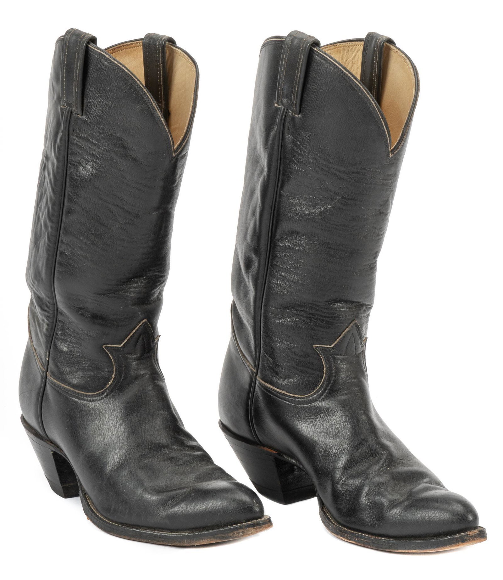 Tony Lama (El Paso, TX) Black Leather Cowboy Boots: Tony Lama Co. (El Paso, Texas) black leather cowboy boots worn by Larry McMurtry, marked on heel, Tony Lama stamp and label inside each, reg. number "12818877", style "J1778 10 D", size 10 D; includes