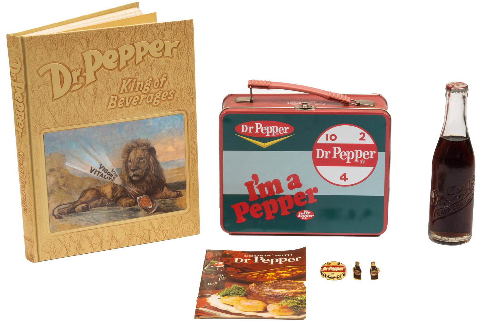 (7) Dr. Pepper Collectibles: Collection of Dr. Pepper-related items, to include a copy of 1979 Dr. Pepper King of Beverages by Harry E. Ellis, printed by Taylor Publishing Company (Dallas, Texas), an unopened Dr. Pepper glass bot