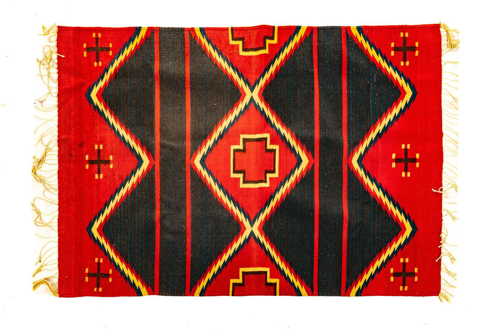 Vintage Southwestern Rug, 6' x 4'1": Handmade Southwestern rug, with diamond and cross motifs, red and black with yellow accents, fringe; includes Certificate of Authenticity: Estate of author Larry McMurtry, from his Archer City, Texas 