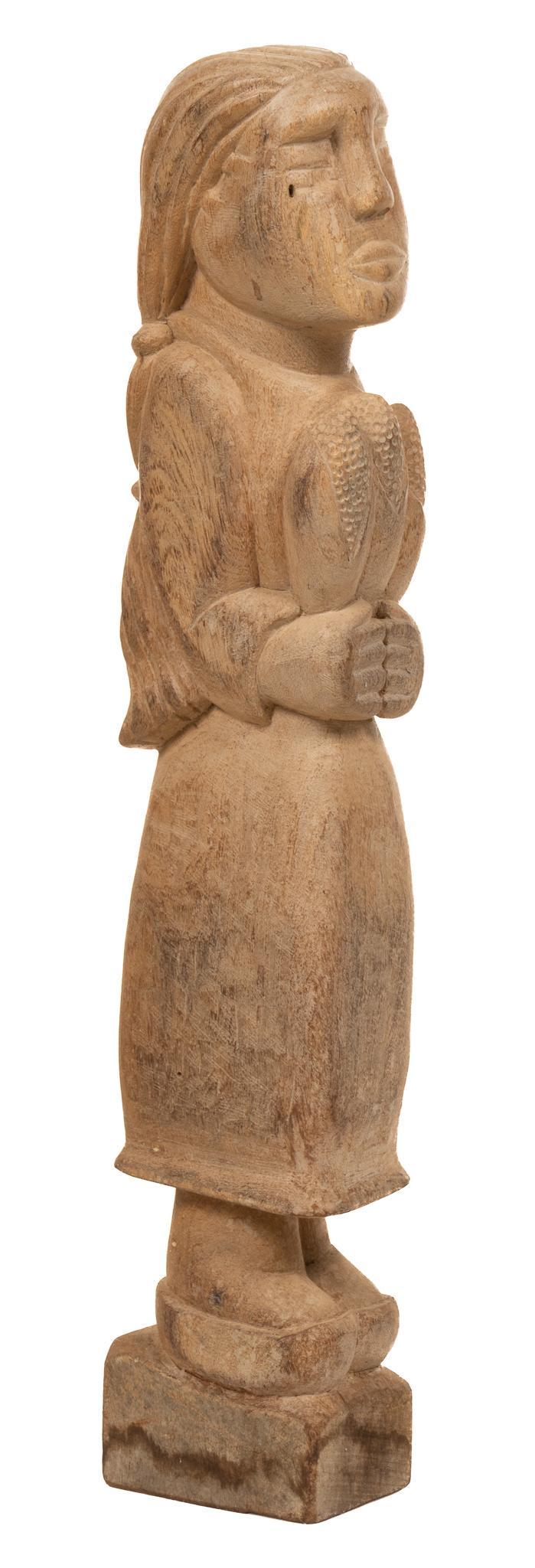 Francisco "Frank" Franklin (b. 1947, Arizona / Mexico) Native American Girl Wood Figure: Hand-carved wood figure of a Native American girl, holding three ears of corn, possibly referring to the "Three Sisters" legend, signed "Francisco" on bottom; includes Certificate of Authenticity: Est