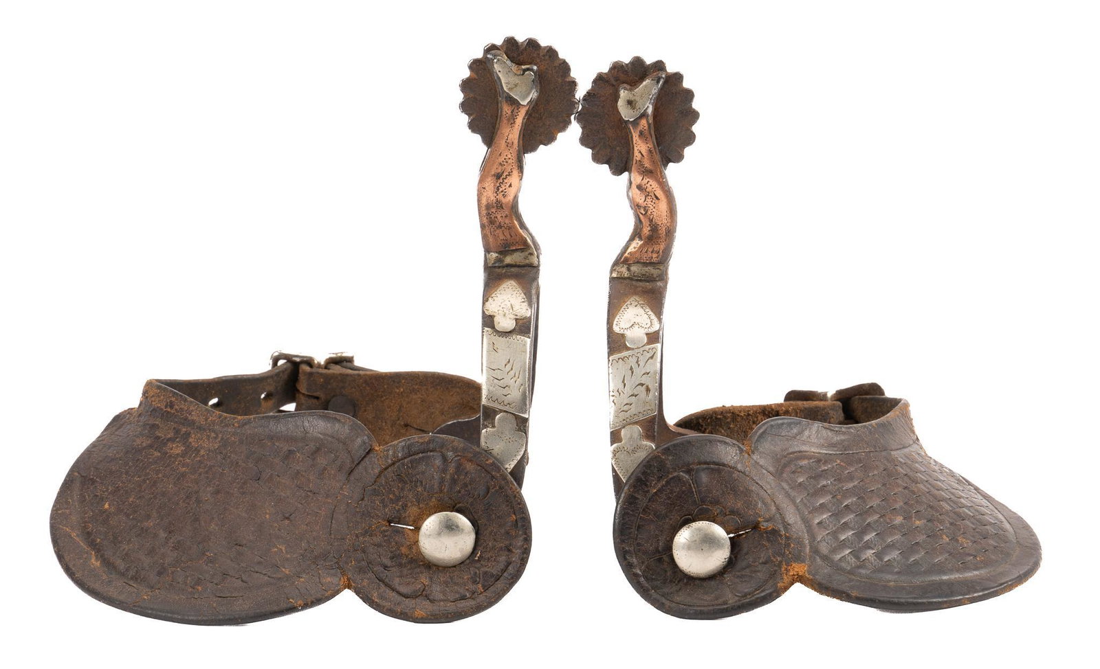 J.R. McChesney No. 8 Gal-leg Spurs: J.R. McChesney gal-leg spurs, pattern number eight, steel heel bands, sixteen point rowels, featuring mounted silver and copper, spade motif, with engraved heart accents, leather heel straps stamped w