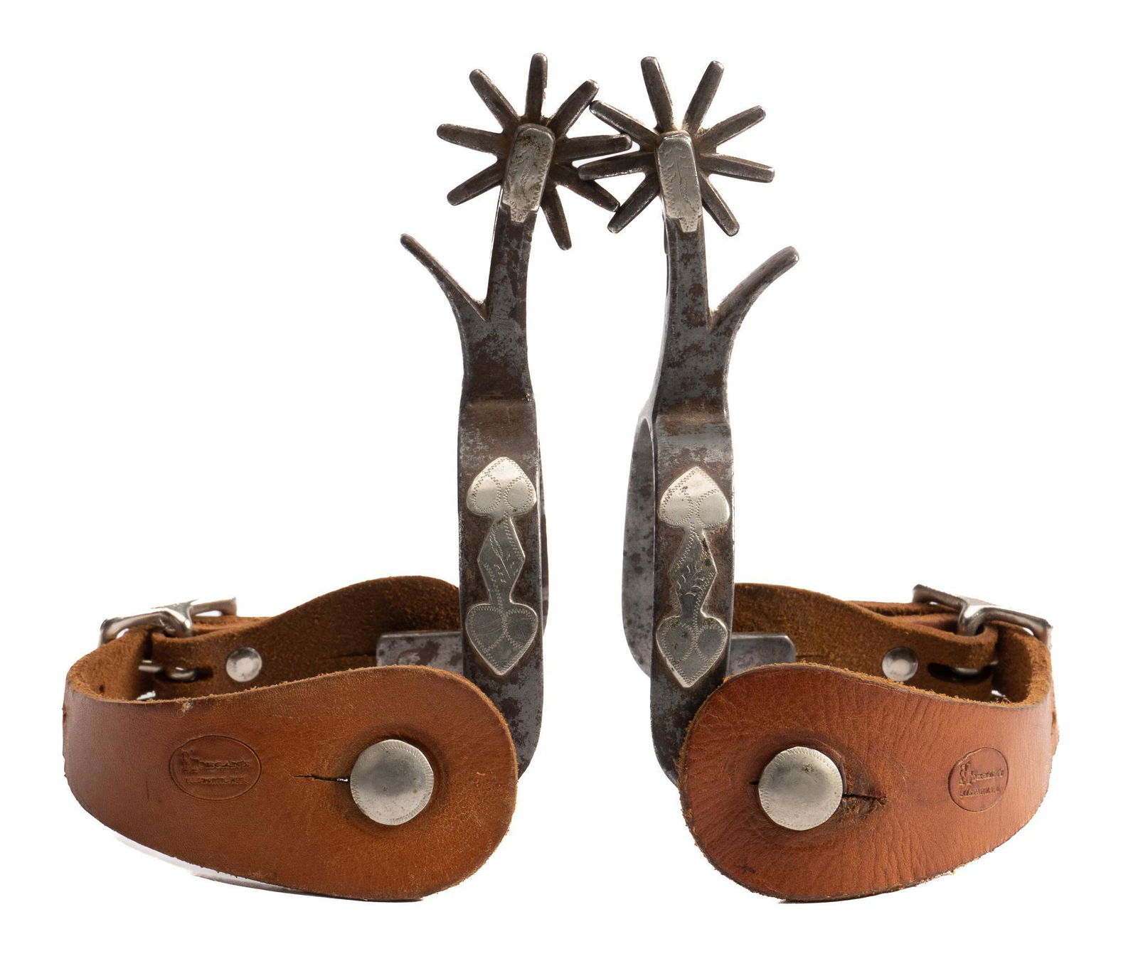 Kelly Bros. Double Mounted Cowboy Spurs: Kelly Bros. double mounted cowboy spurs, steel heel bands with silver double spade pattern mountings, nine point rowels, marked on side of heel band heel band width 3.25 in. x spur band length 6 in.