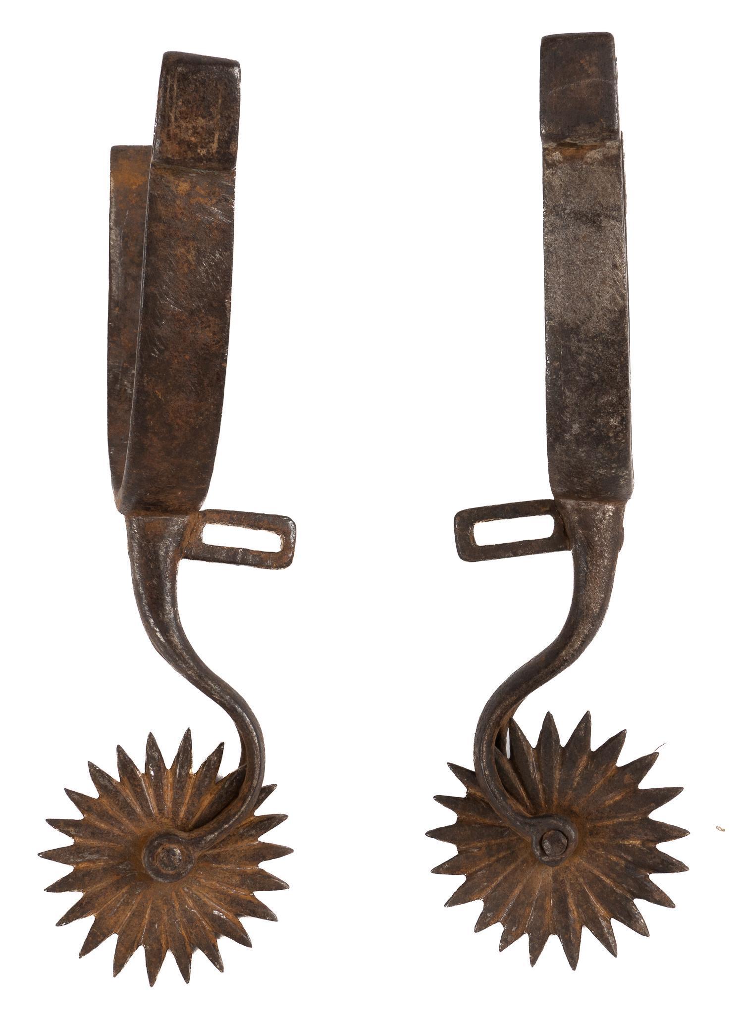 Mexican Gaucho Spurs: Mexican gaucho spurs, with steel heel bands, twenty-two point rowels heel band width 4.25 in. x spur length 8 in. Provenance: An Estero, Florida collection We happily provide seamless shipping service