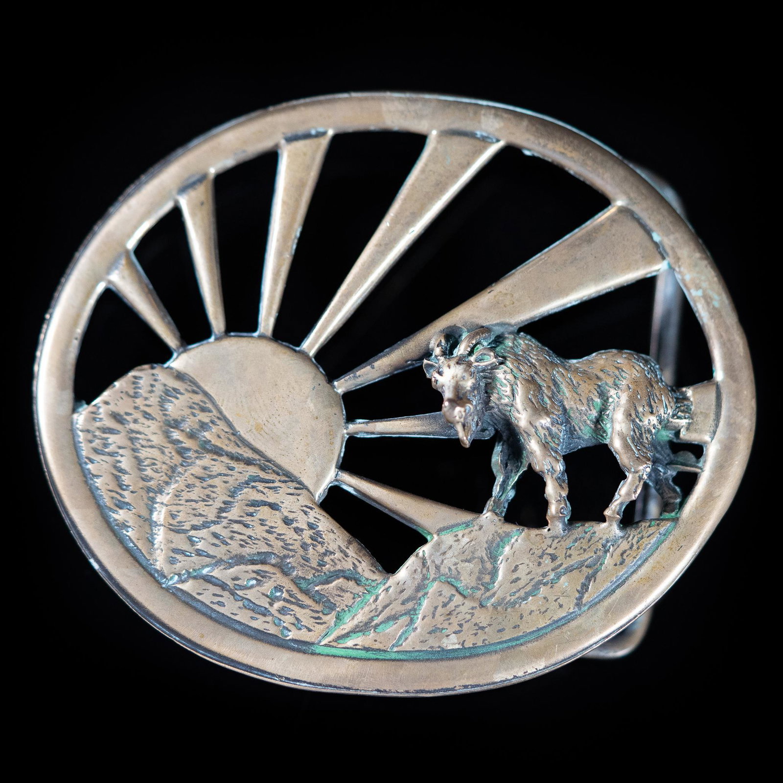 Vintage Century II Solid Brass Mountain Goat Belt Buckle: Vintage Century II solid brass belt buckle depicting a mountain goat standing in front a sunrise, marked on back "Solid Brass / c 1978 / Century II / P.O. Box 62 / Broomfield, Colo." height 2 