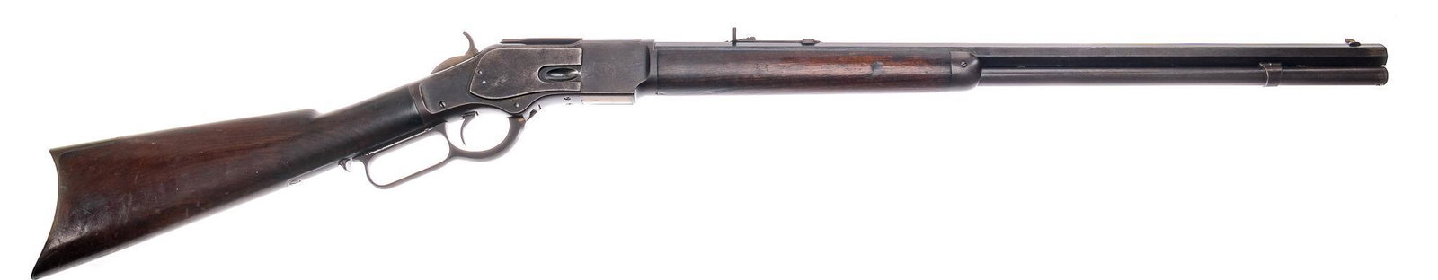 Winchester 1873 .38WCF Lever-Action Rifle: Serial: 268377 B Manufacturer: Winchester Repeating Arms Co. (c. 1888) Model: 1873 Caliber: .38WCF Barrel length: 24 in. OAL: 43 in. Condition: Good; walnut stock has handling marks & patina from 