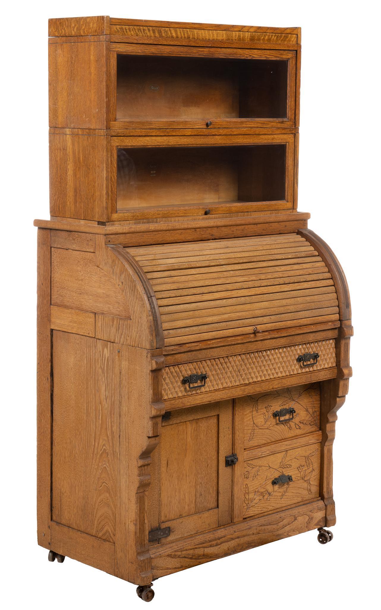 Macey Furniture Co. (MI) Stacking Bookcase Desk: Macey Furniture Co. (Grand Rapids, Michigan) model 79 roll top desk, opening to drawers, letter slots, pigeon holes, over sliding writing surface, above drawer featuring carved geometric front, cabine