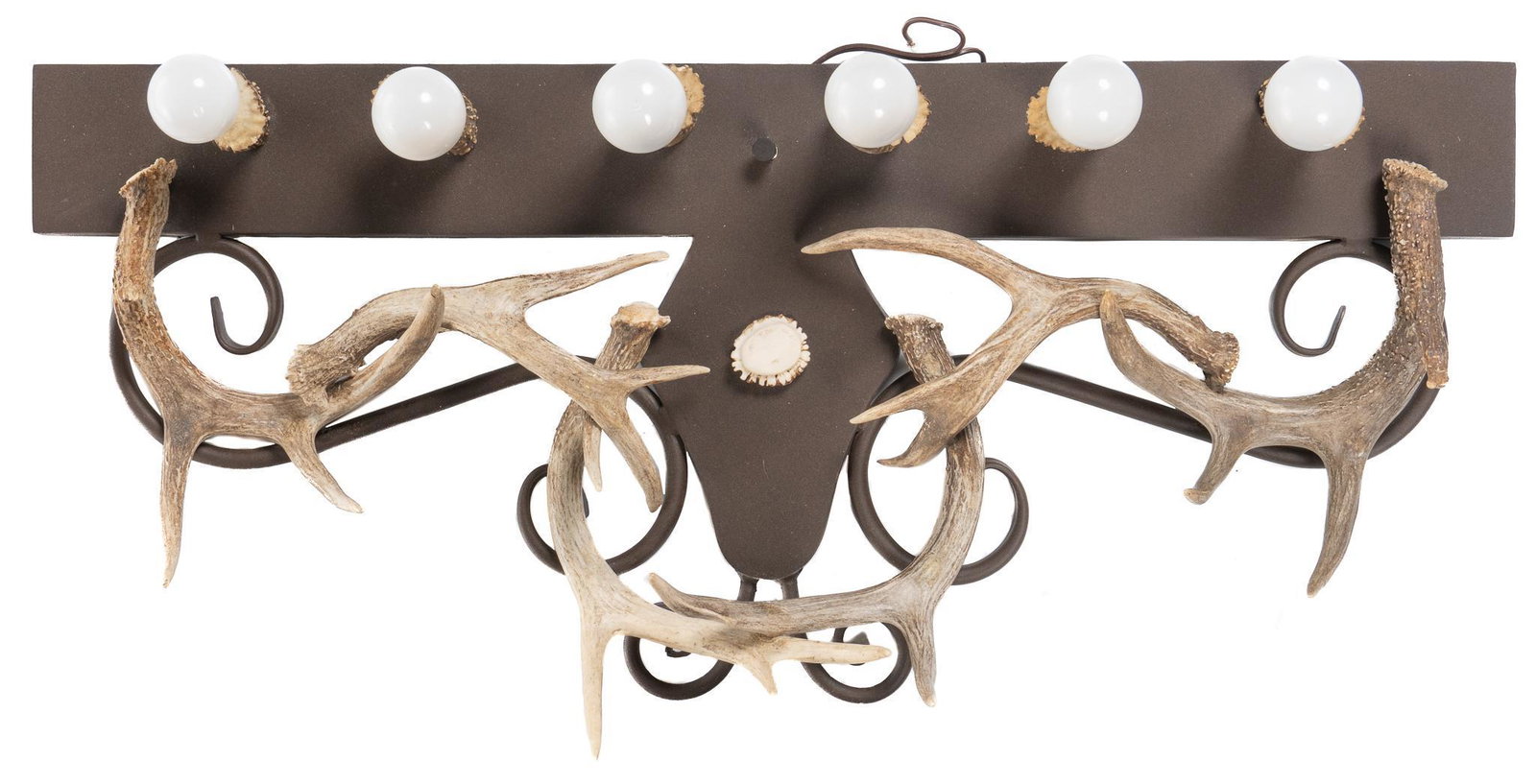 Antler Wall Light Fixture: Antler wall hanging light fixture, metal frame with a row of six light bulb sockets at the top, six intertwined antlers below layered over scrollwork, a cut disc of antler at center and behind each li