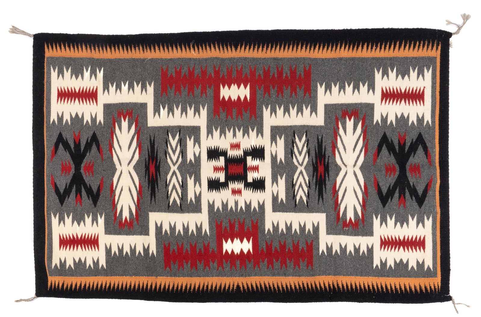 Navajo Storm Pattern Style Blanket, 4'4" x 2'9": Navajo Storm Pattern style blanket, with black border, tan, red, cream, and black geometric designs, on gray field 4 ft. 4 in. x 2 ft. 9 in. Provenance: A San Antonio, Texas collection We happily prov