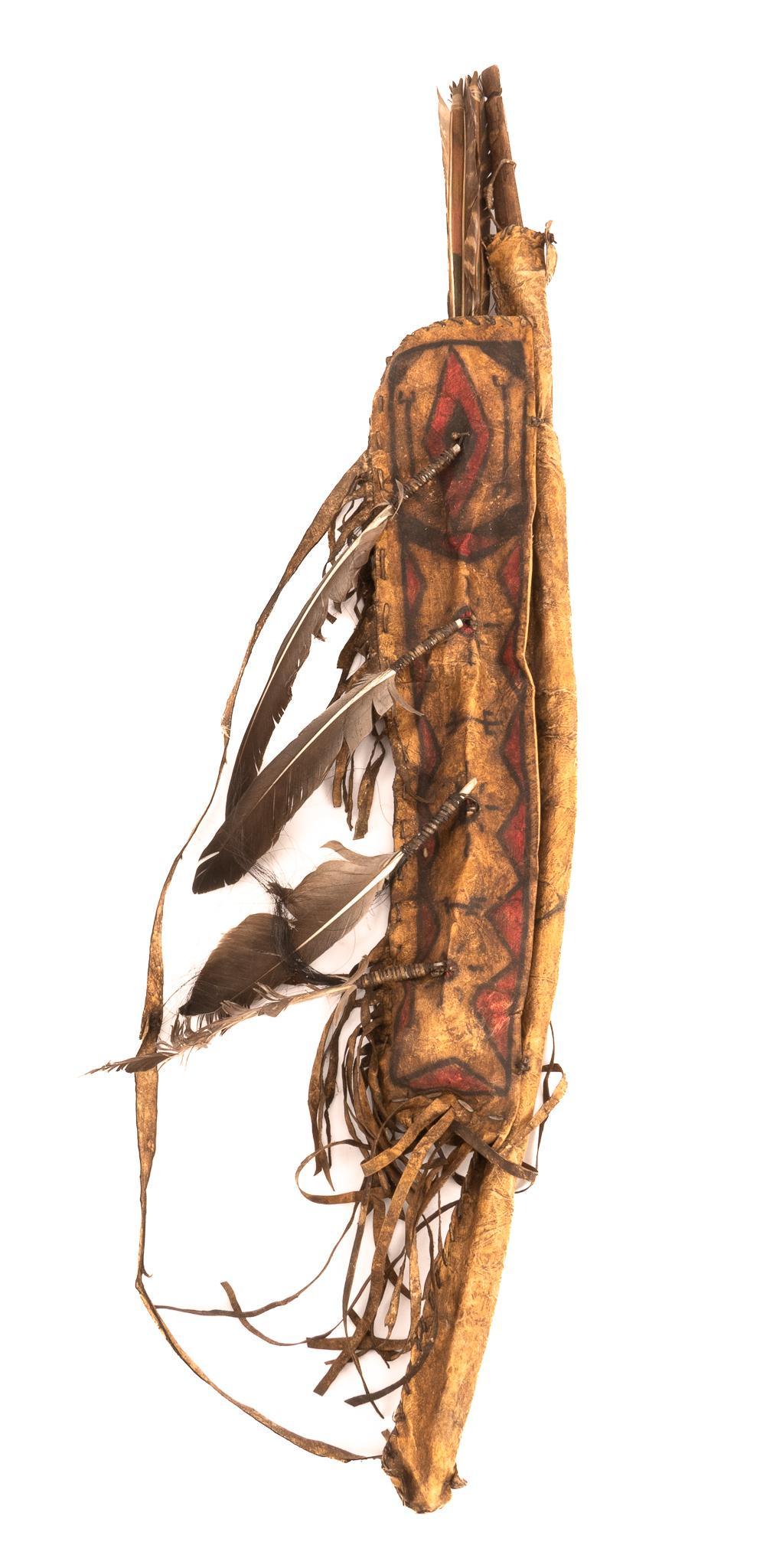 Pafleche Bow and Quiver: Parfleche bow and quiver, featuring painted geometric designs, feather embellishments, arrows, bow case length 36 in. x width 9 in. Provenance: An Alamo Heights, Texas collection We happily provide