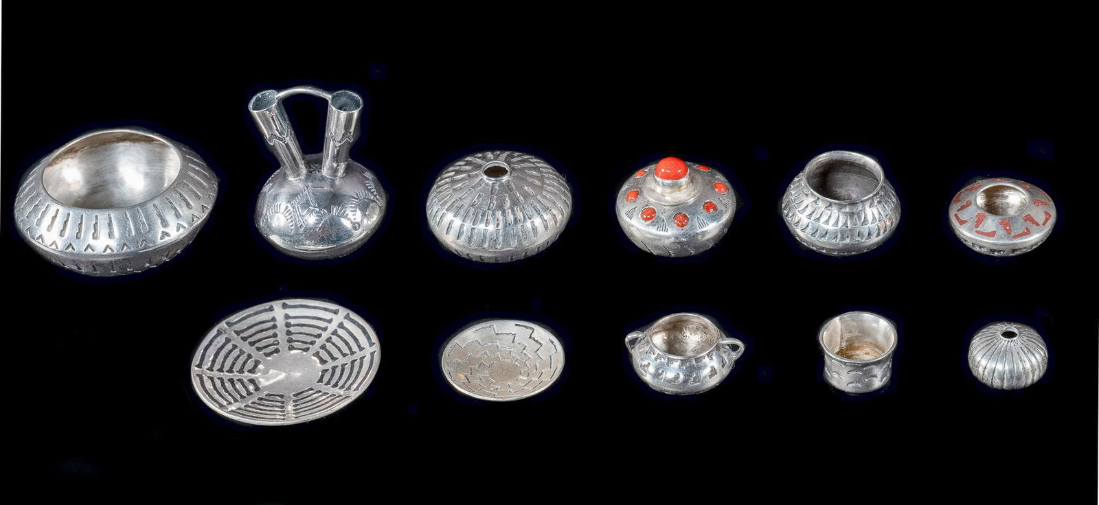 Collection of (11) Southwest Native American Vintage Miniature Sterling Silver Pottery and Baskets: Collection of Southwest Native American vintage miniature sterling silver pottery and baskets, including a wedding vase, wedding / ceremonial baskets, two with stone inlay, some Navajo examples, weddi