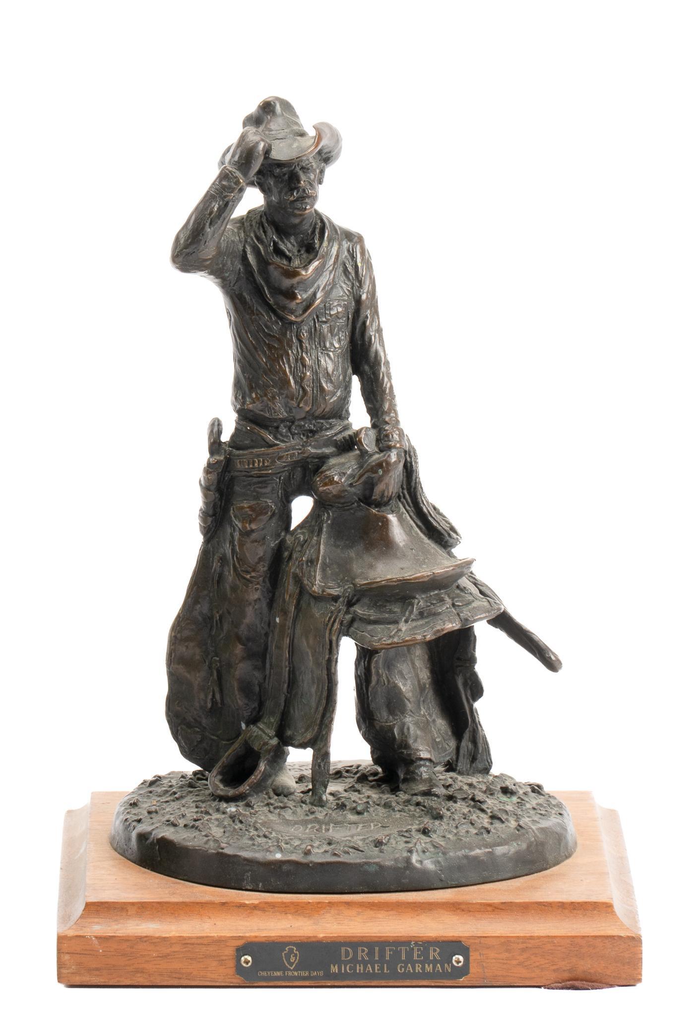 Michael Garman, "Drifter", 1982: Michael Garman (Texas, b. 1938), "Drifter", 1982, bronze sculpture, ed. 60/1000, on wooden base with plaque from Cheyenne Country Days height 11 in. x width 7.5 in. x depth 6.5 in. Provenanc