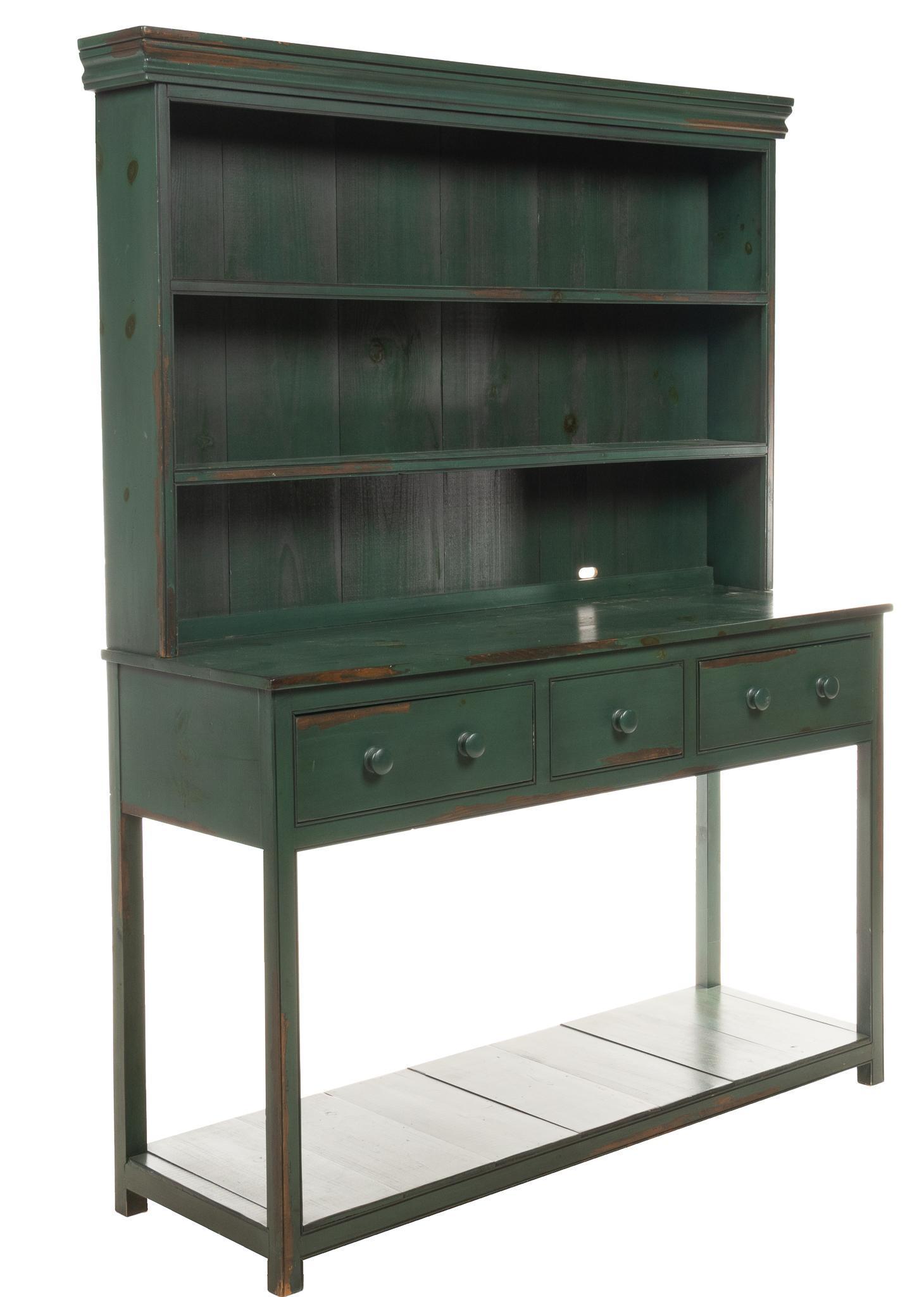 Painted Mercantile Display Counter: Painted green wooden mercantile / general store display case counter, in two parts, the top having two shelves above a three drawer cabinet raised on block legs total height 80 in. x width 60 in. x d