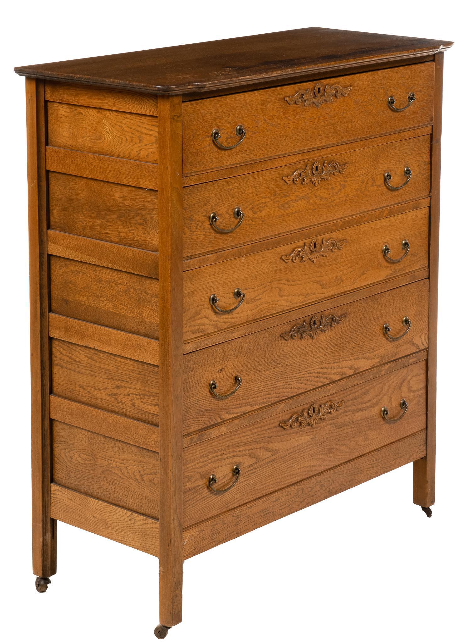 Chest of (5) Drawers: Chest of drawers, with dark finished beveled top, over five stacked drawers, featuring brass U-shape pulls, foliate escutcheons, rising on casters height 46 in. x width 37 in. x depth 16.5 in. We happ