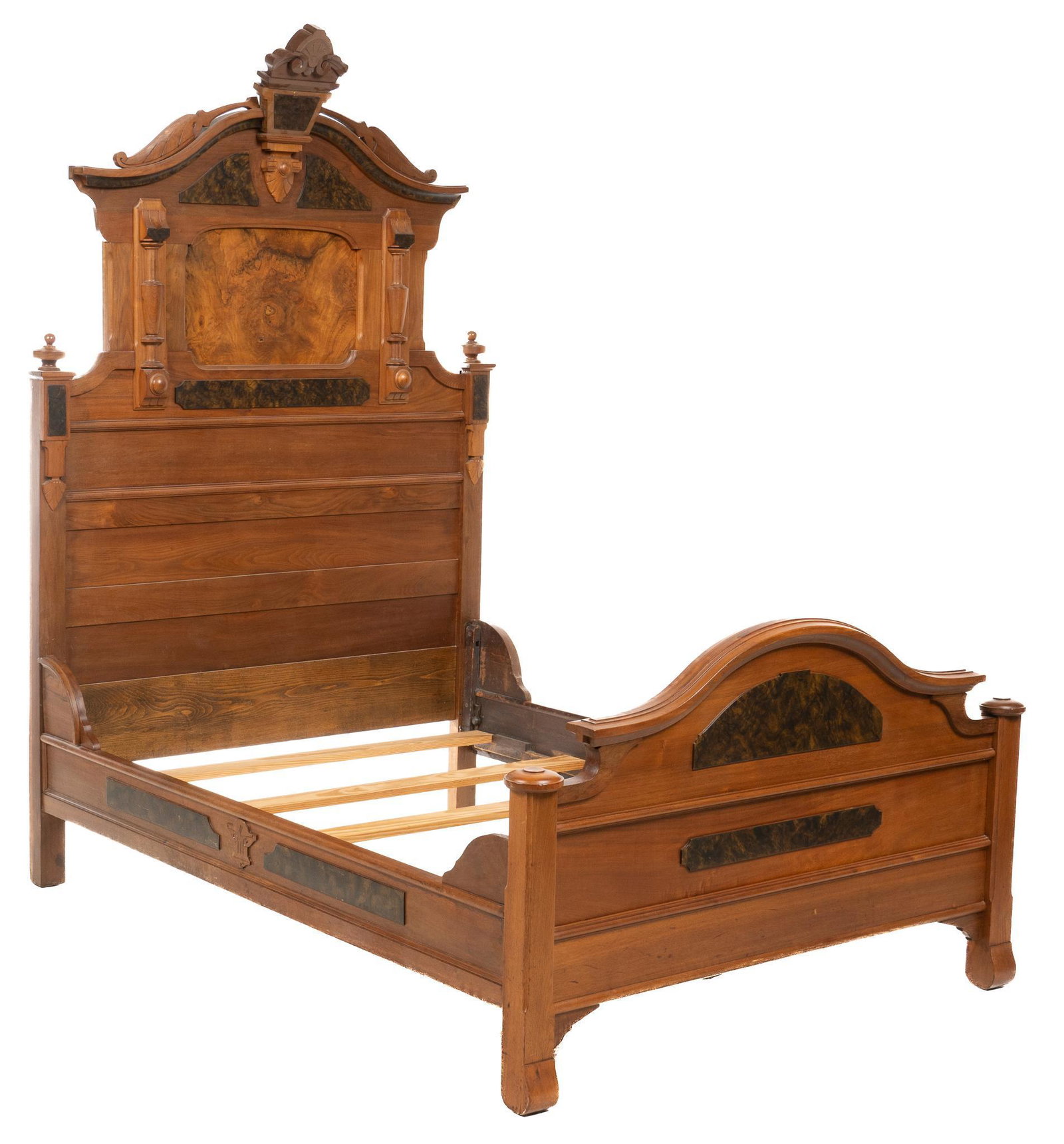 Eastlake Style Burlwood Bed: Eastlake style full size bed, featuring architectural motifs, arched crest, carved and turned accents, burl wood inlay and overlay, includes slats height 88 in. x width 59 in. x depth 82 in. We happil
