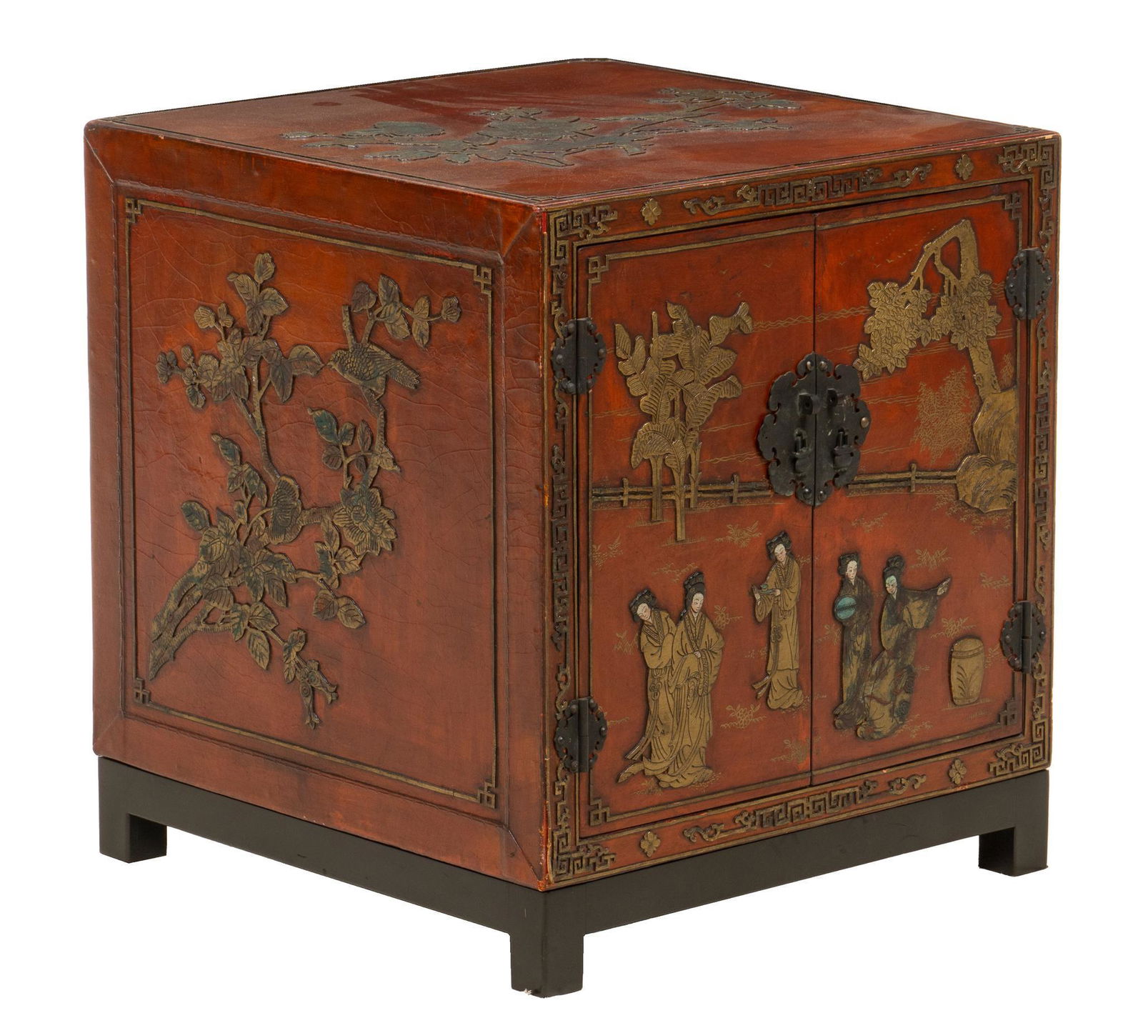Chinoiserie Cabinet: Chinoiserie cabinet, with textured surface, Asian style reliefs, carved from wood and painted with metal banding, doors opening to two shelves, includes extra hardware / lock mechanism height 22 in.