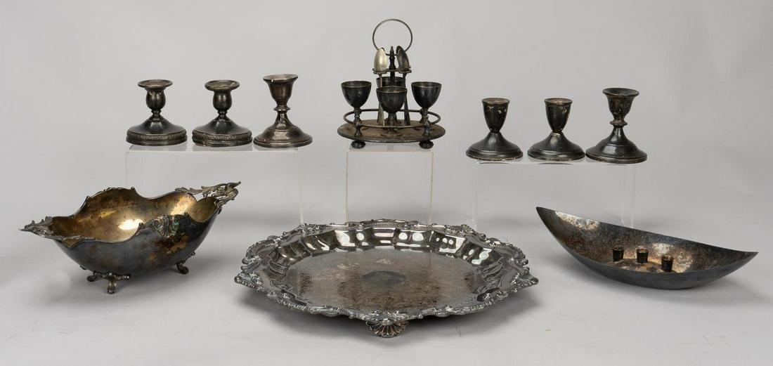 (10) Assorted Sterling Silver and Silverplate Pieces: Ten assorted sterling silver and silverplate pieces, including weighted sterling silver candle holders, a silverplate tray, one egg cup set with spoons, one tureen, and one silverplate Gorham candle v