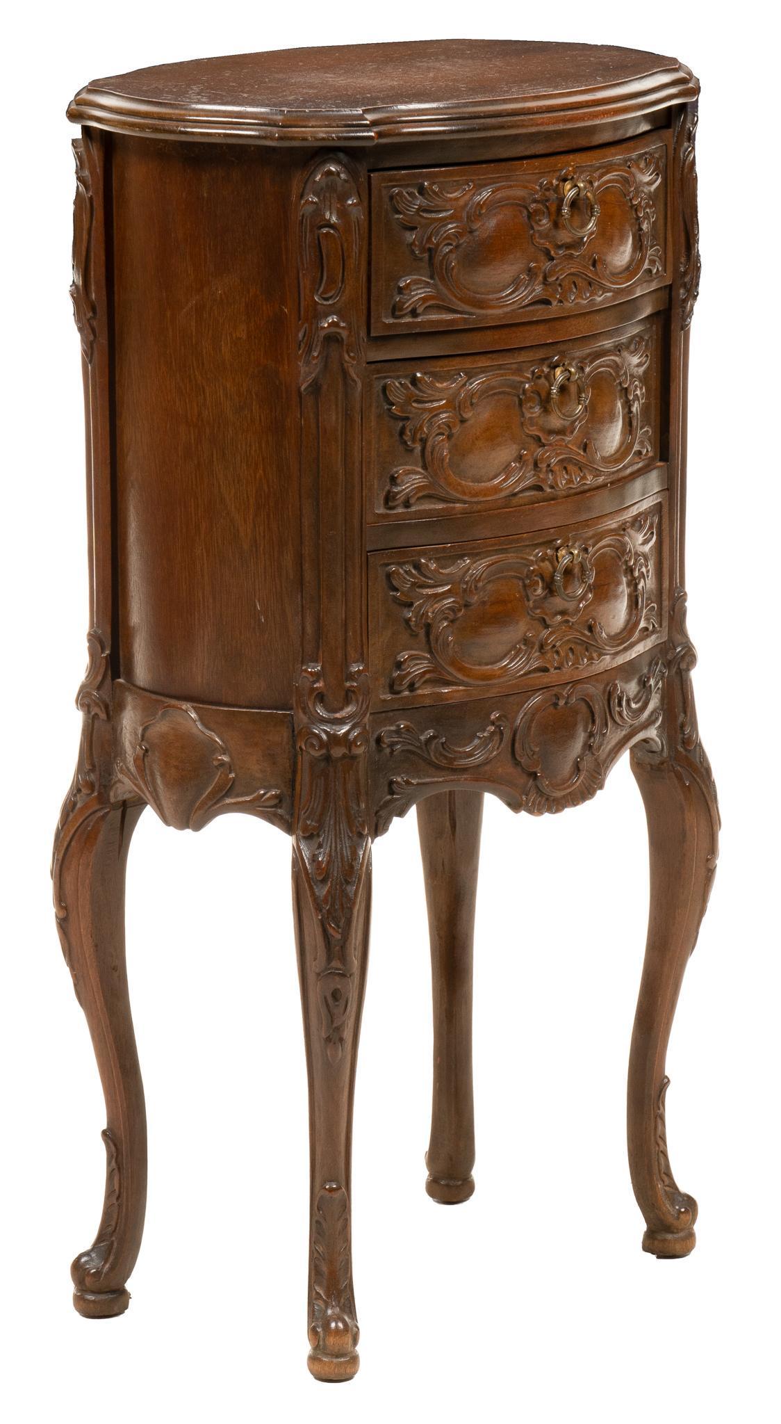 Louis XV Style Nightstand: Louis XV style nightstand, with beveled top, over three stacked drawers, featuring heavily carved C scroll accents, over serpentine apron, cabriole legs height 30.5 in. x width 17 in. x depth 12.25 in