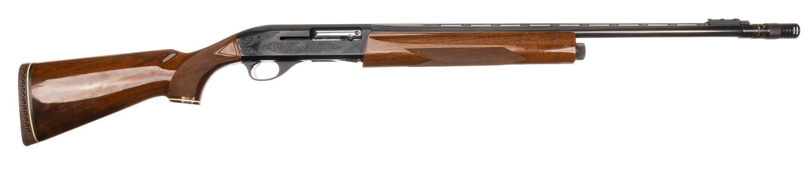 Smith & Wesson Model 1000 20 Gauge Semi Auto Shotgun: Serial: FS29596 Manufacturer: Smith & Wesson Model: 1000 Caliber: 20 Gauge Barrel Length: 26 in. w/ Poly Choke (2.75 in. chamber) OAL: 46.5 in. Condition: Very Good; wood stock has very light han