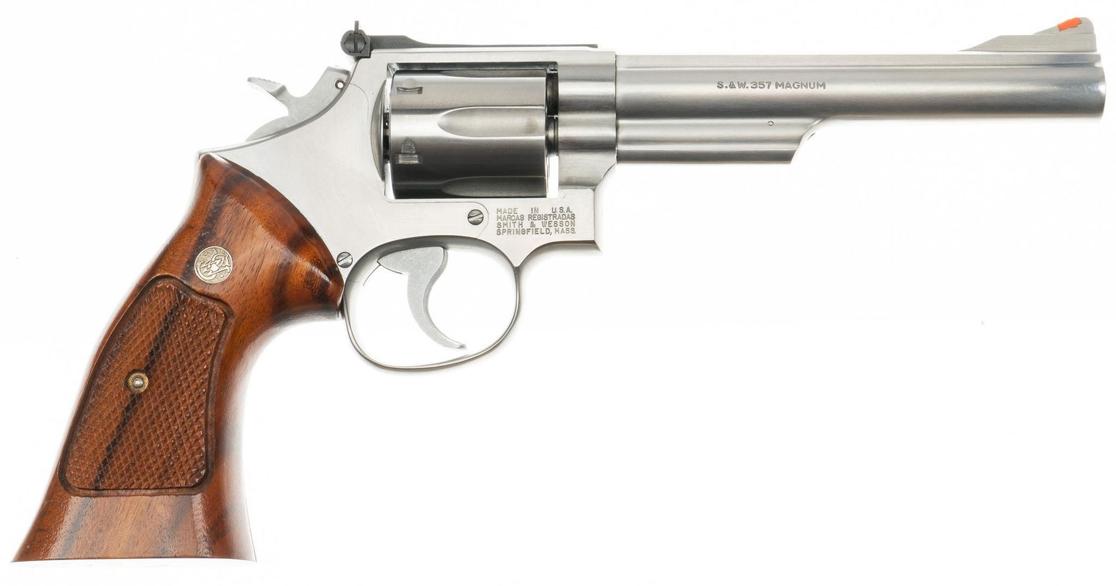 Smith & Wesson Model 66-2 357 Magnum Revolver: Serial: AUB4614 Manufacturer: Smith & Wesson Model: 66-2 Caliber: 357 Magnum Barrel length: 6 in. OAL: 11.5 in. Condition: Good; wood checkered Combat grips have very light handling marks; barrel