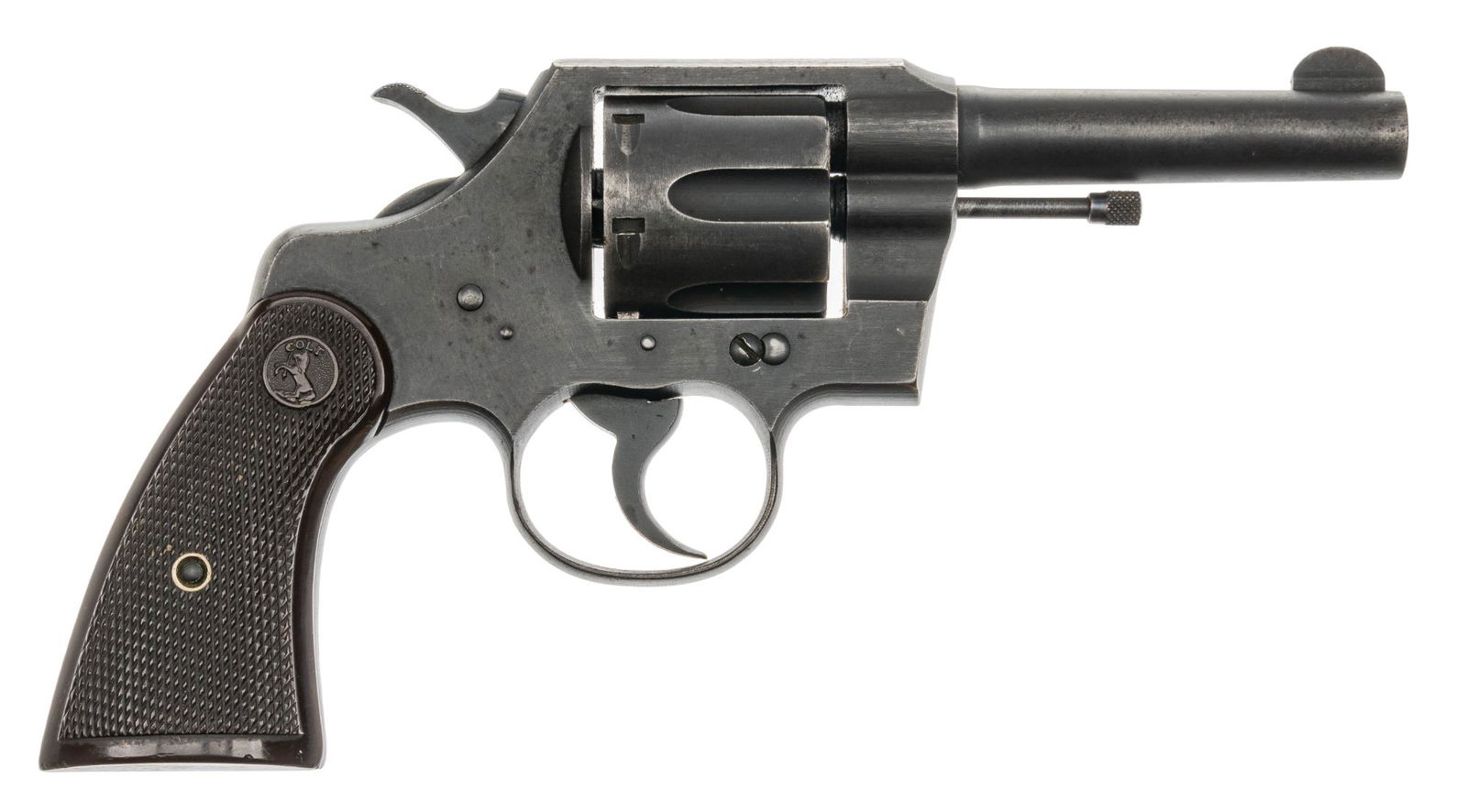 US WWII Colt Commando 38 Special Revolver: Serial: 9052 Manufacturer: Colt (c. 1942) Model: Commando Caliber: 38 Special Barrel length: 4 in OAL: 9.5 in Condition: Very Good - Good: Bakelite grips have light handling marks; frame cylinder and