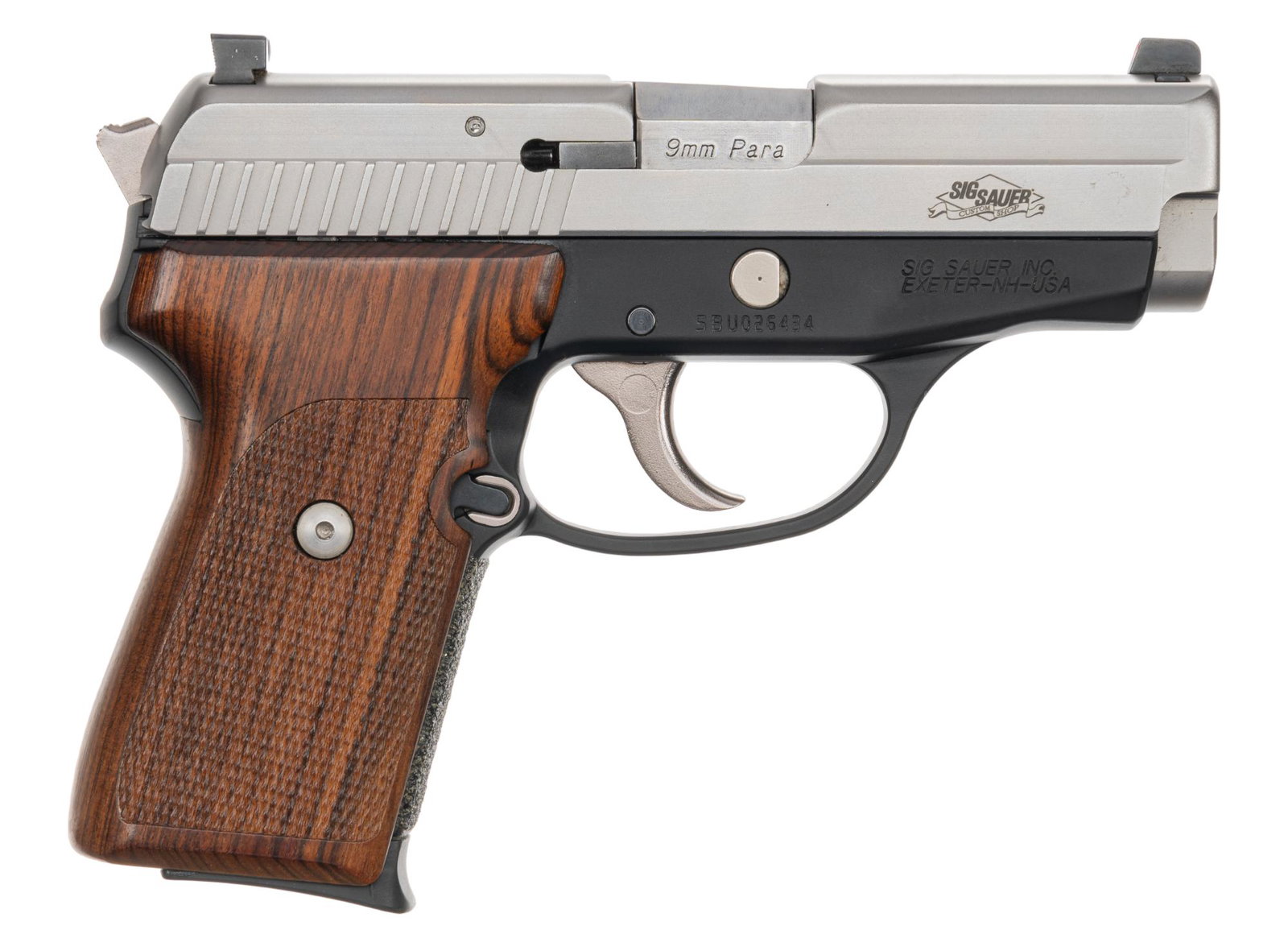 Sig Sauer Custom Shop P239 SAS 9mm Semi Auto Pistol: Serial: SBU026434 Manufacturer: Sig Sauer Model: P239 Caliber: 9mm Barrel length: 3.6 in. OAL: 7 in. Condition: Excellent - Very Good; wood grips have near no handling marks; slide & frame have ne
