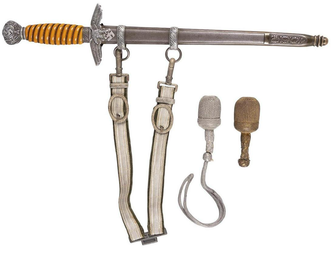 German WWII Airforce Luftwaffe Dagger w/ Accessories: Manufacturer: Alcoso , Solingen Model: M1937 Blade Length: 10 in. Overall Length: 16.75 in. Condition: Very Good; blade has marks from insertion into the scabbard with some light darkening marks; guar