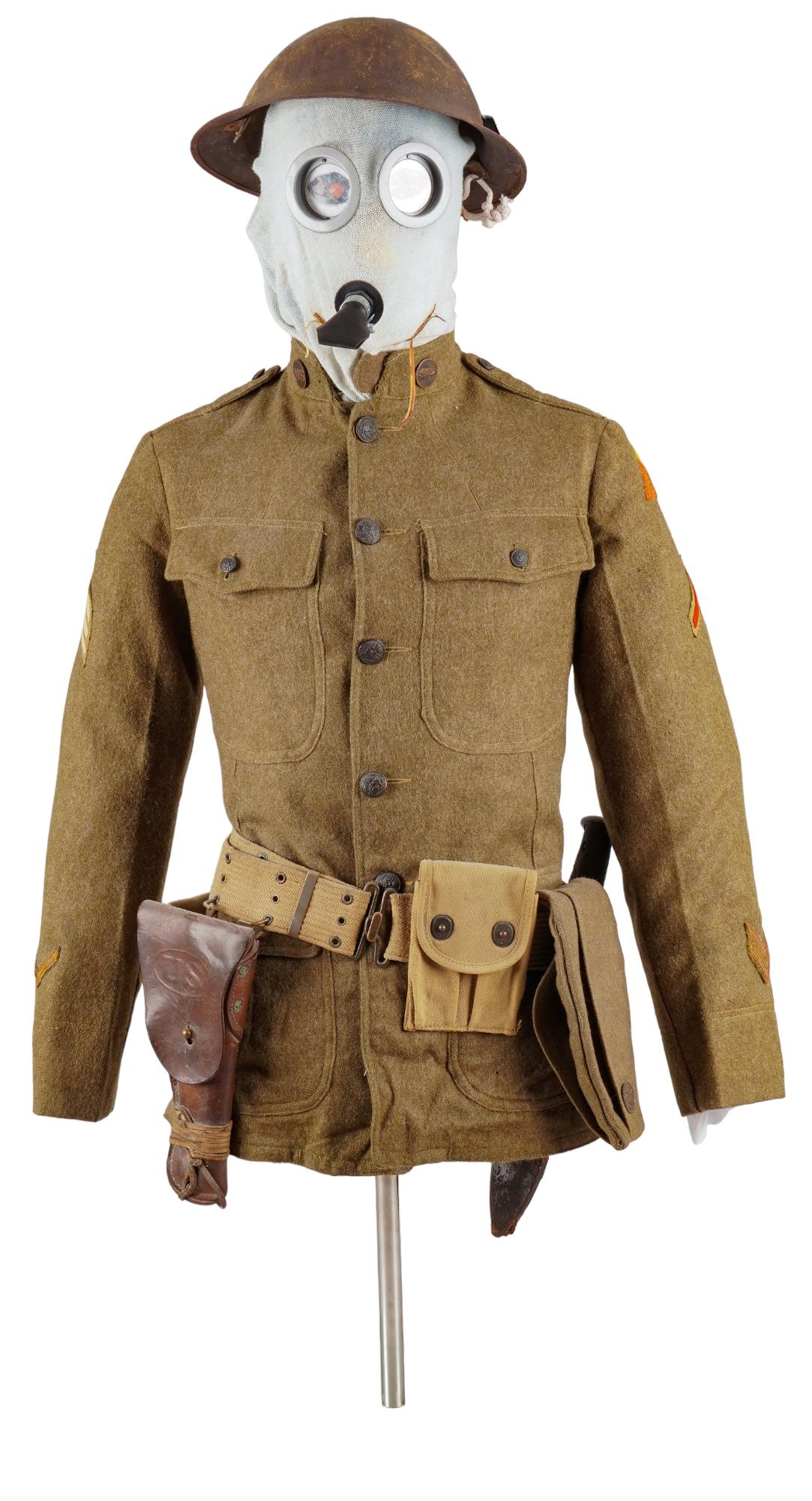 WWI US Army Uniform on Mannequin W/ Accessories: Includes: -WWI US Army outer wool coat w/ Tank Corps patch; random rank patches; Tank Corps collar tab -tan canvas gear belt w/ pouches -G&K 1818 M1916 leather 1911 pistol holster -Plumb M1917 Bol