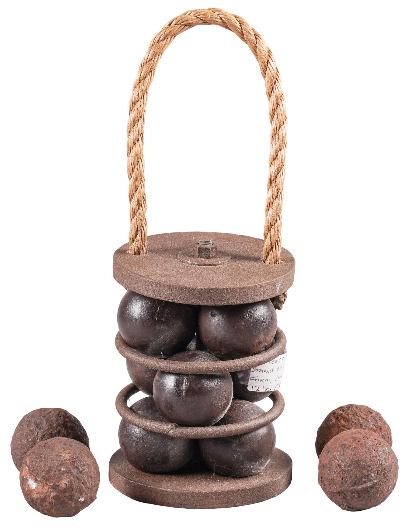 Civil War 12 Lb Strand of Grape Shot: Model: 12 Lb gun strand of grape shot Overall Length: 7.5 in Condition: Good; Shot has brown patina but no pitting (minus original casting pits); Shot and rings are original, but carrier and rope are 