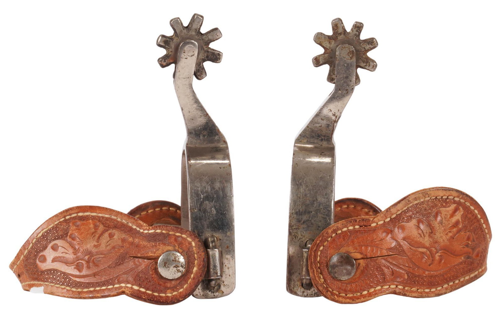 Wally Boone, Engraved Spurs: Wally Boone, engraved spurs, featuring engraved vine motif, with eight point rowels, leather heel bands with embossed floral design, marked "Boone" on inside of heel band heel band width 4.25 
