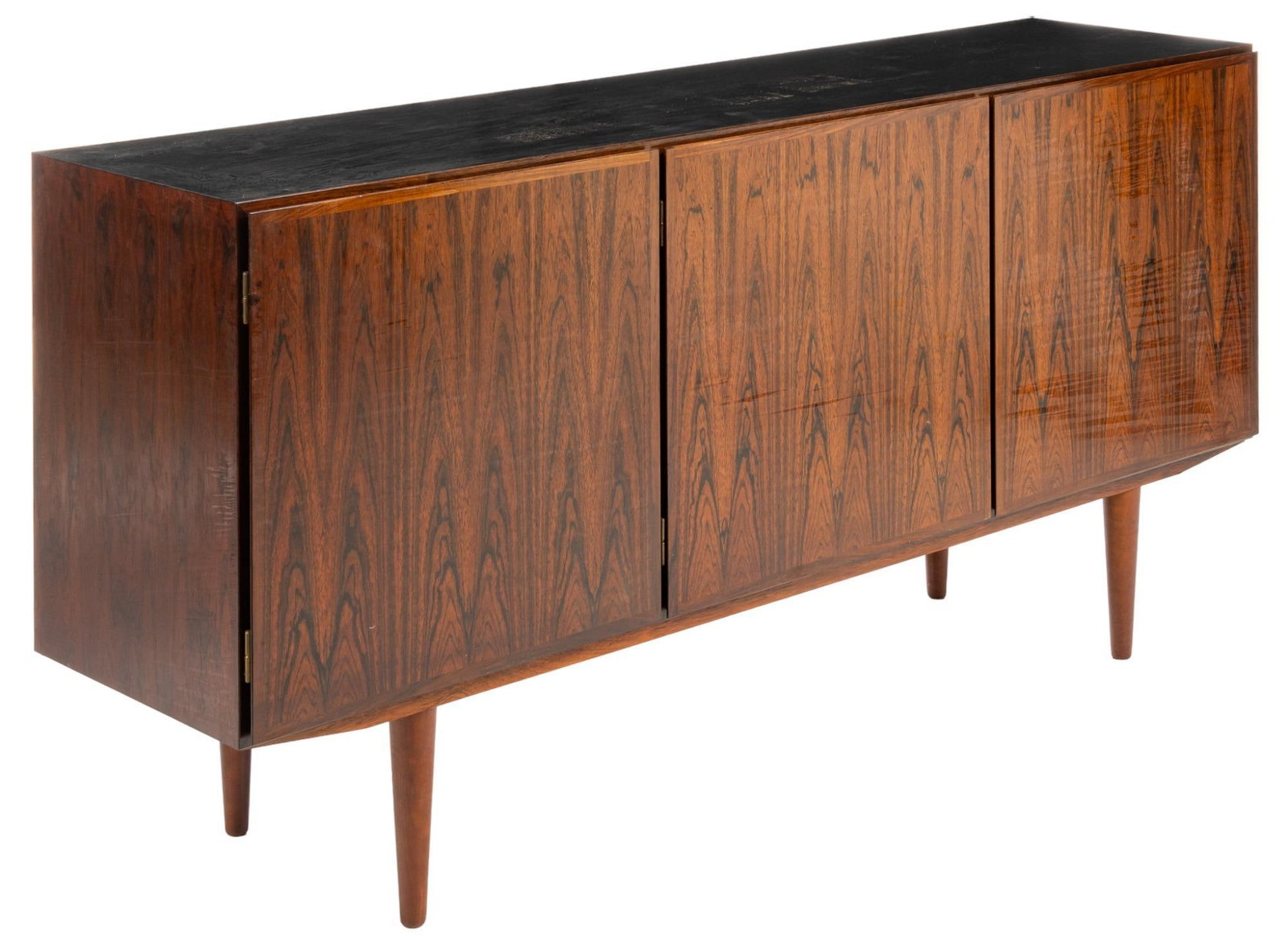 Danish Mid-Century Credenza: Danish Mid-Century credenza / sideboard, three doors open to ample shelving space, supported by tapered pin-legs height 33.5 in. x width 70.5 in. x depth 17.5 in. We happily provide seamless shipping 