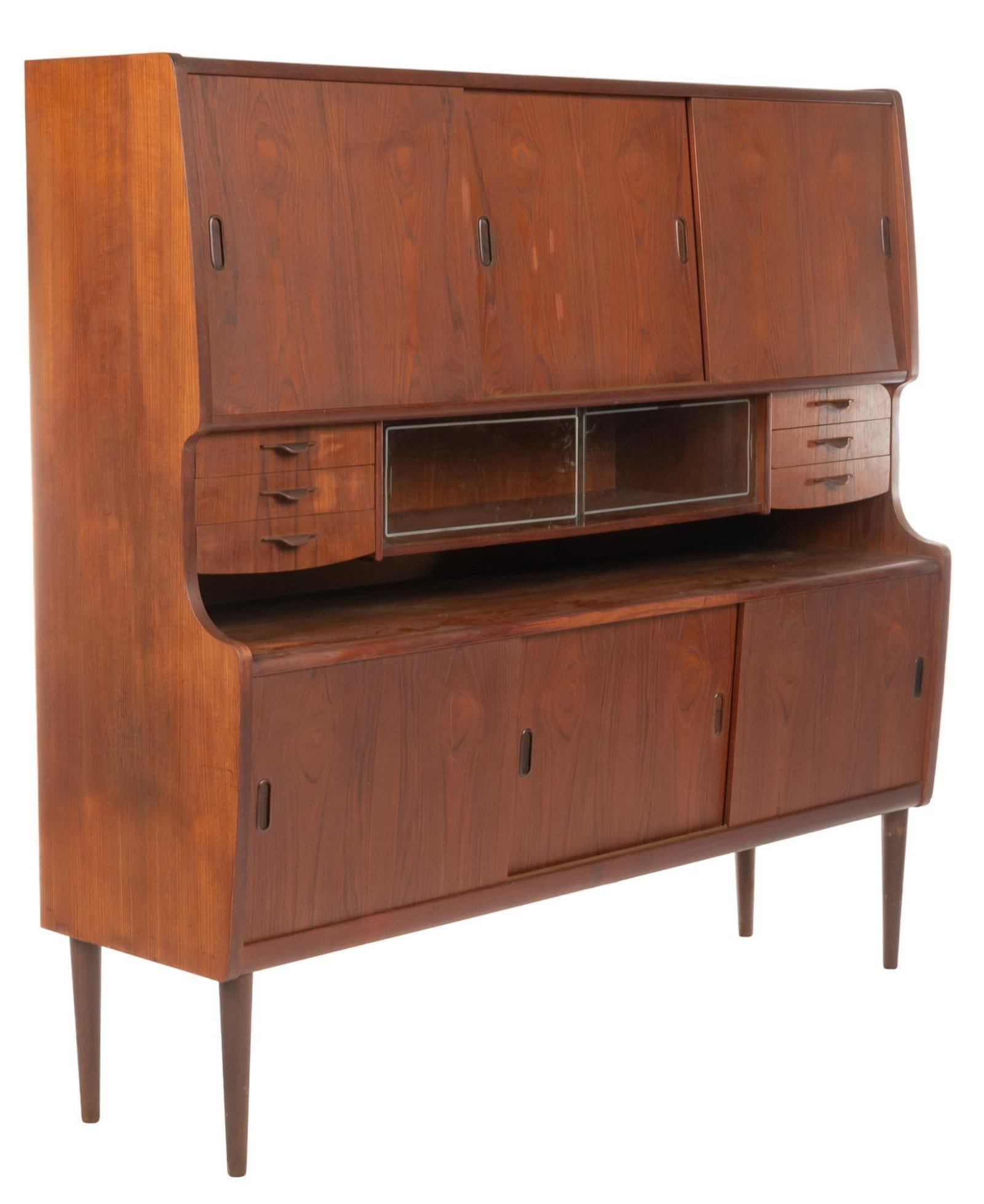 Danish Mid-Century Sideboard: Danish Mid-Century sideboard, with three sliding doors, opening to interior storage, three stacked drawers, over sliding glass door, opening to shelf, flanked by three stacked drawers, supported on cr