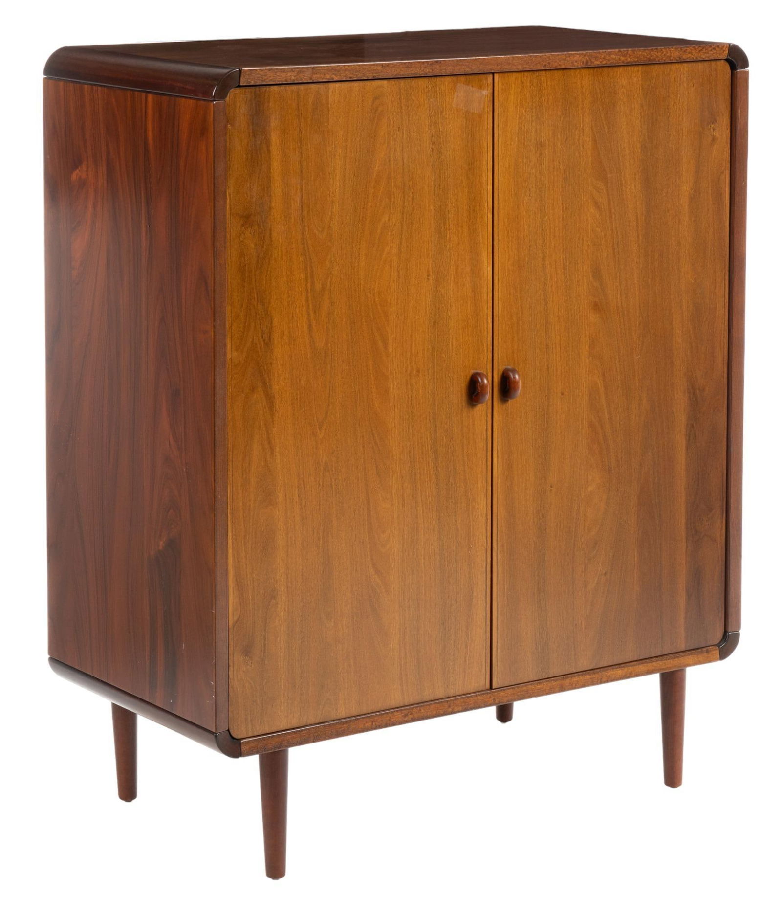 Danish Mid-Century Cabinet: Danish Mid-Century cabinet, featuring frame with rounded inlaid corners, two doors, featuring small rounded geometric pulls, opening to three shelves, on pin legs height 47.5 in. x width 39 in. x dep