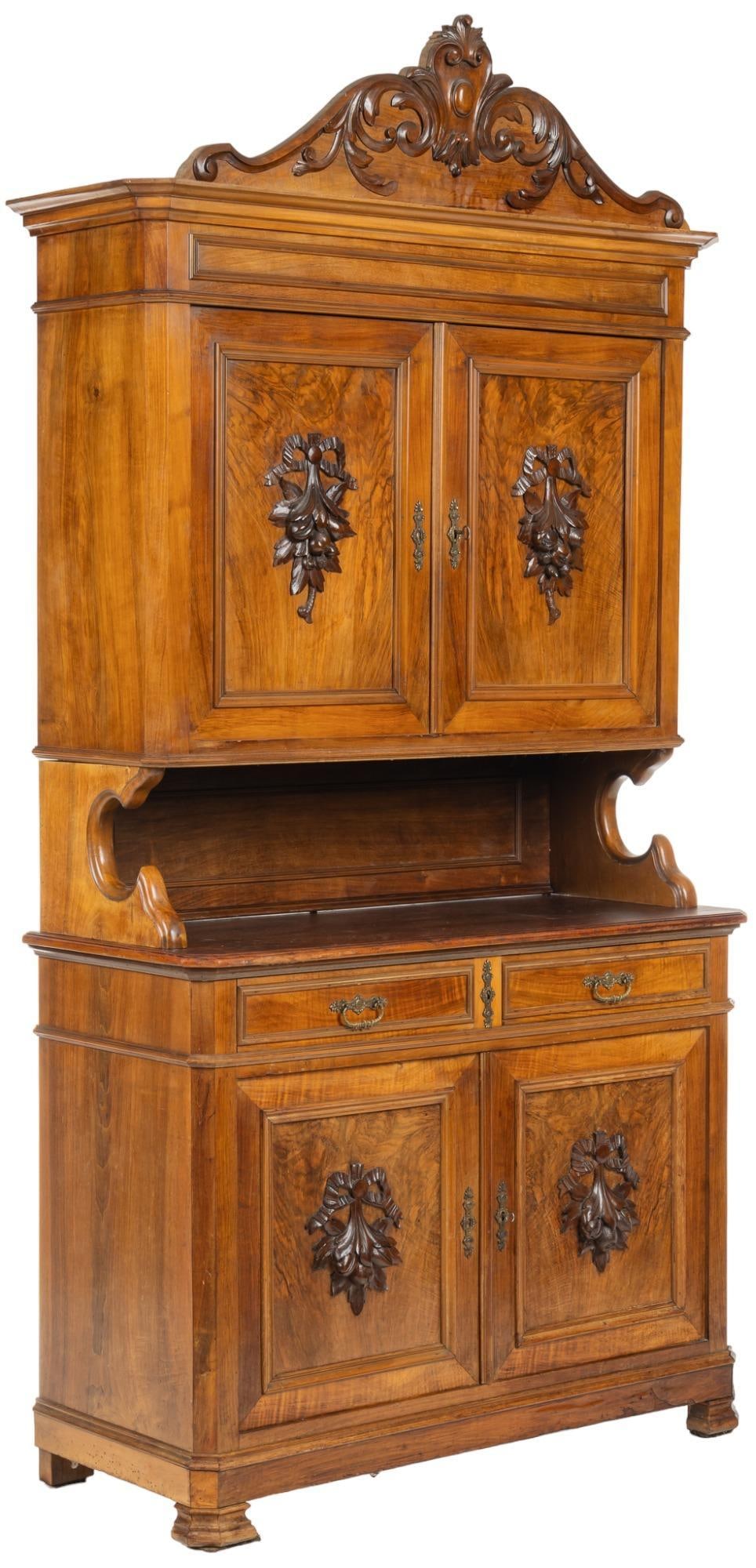 Carved Hutch: Carved hutch, with scrolling crest, upper storage tier, with two cabinet doors, leading to interior shelving, supported on sideboard base, with two drawers, two cabinet doors, opening to two shelves, 