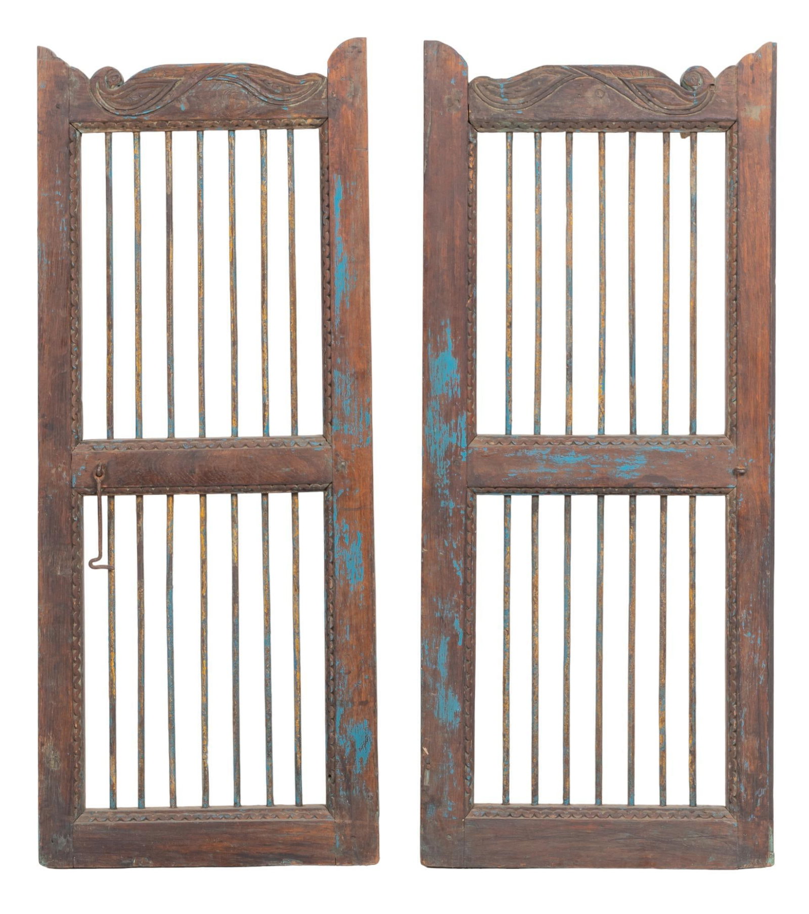 Pair of Teak Gates: Pair of carved teak gates, with iron accents and hardware height 45 in. x width 18 in. x depth 1.75 in. We happily provide seamless shipping services on everything we sell. Please email us at shipping