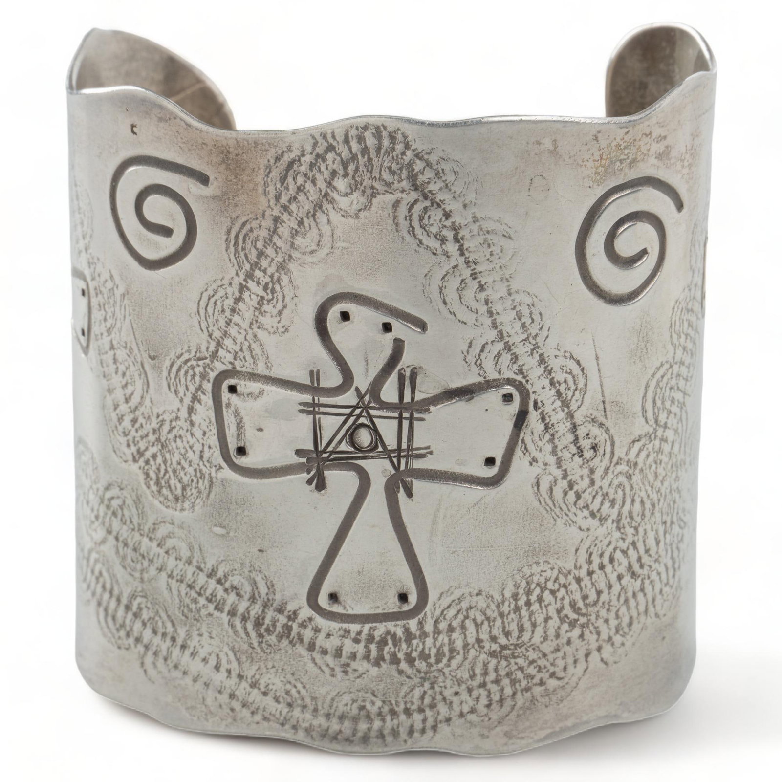 L. Abbot Native American Sterling Silver Cuff: L. Abbot Native American sterling silver cuff, wave, swirl, and cross etchings, marked circumference 7 in. width 2.75 in. We happily provide seamless shipping services on everything we sell. Please em