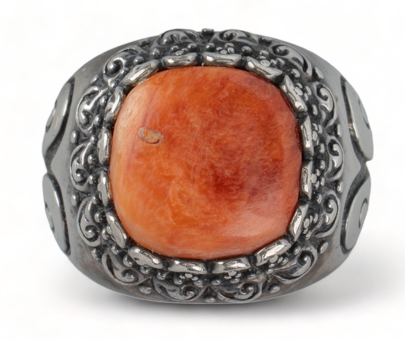 Sterling Silver Coral Stone Ring: Sterling silver coral stone ring, ornate metal relief etching, sweat soldering designs, marked size: 8 We happily provide seamless shipping services on everything we sell. Please email us at shipping&