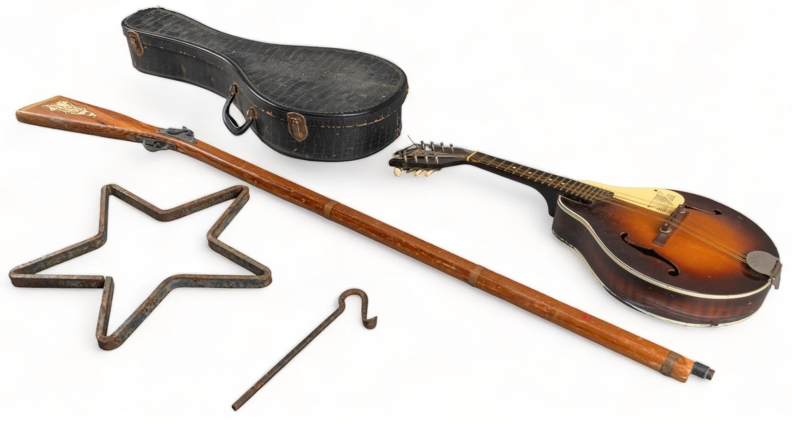 Collection of Rustic Home Decor Accents: Collection of rustic home decor accents, to include one vintage mandolin, marked "Kay", one vintage toy rifle, two iron tools length 52 in. x width 1 in. / rifle Provenance: A San Antonio, Tex